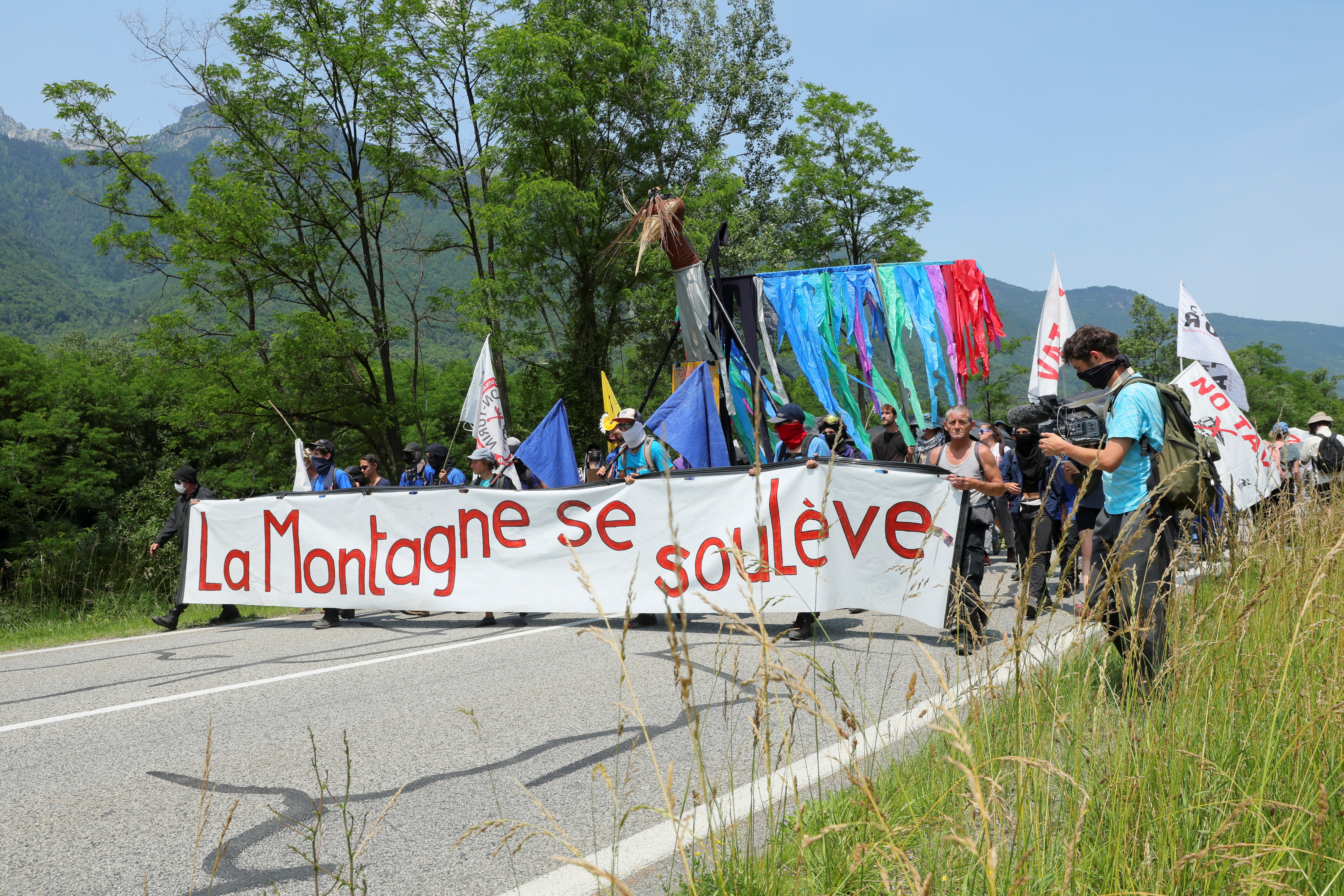 Activists take part in a protest against the Lyon-Turin rail link between France and Italy in La Chapelle near Saint-Jean-de-Maurienne, France, June 17, 2023. REUTERS/Denis Balibouse