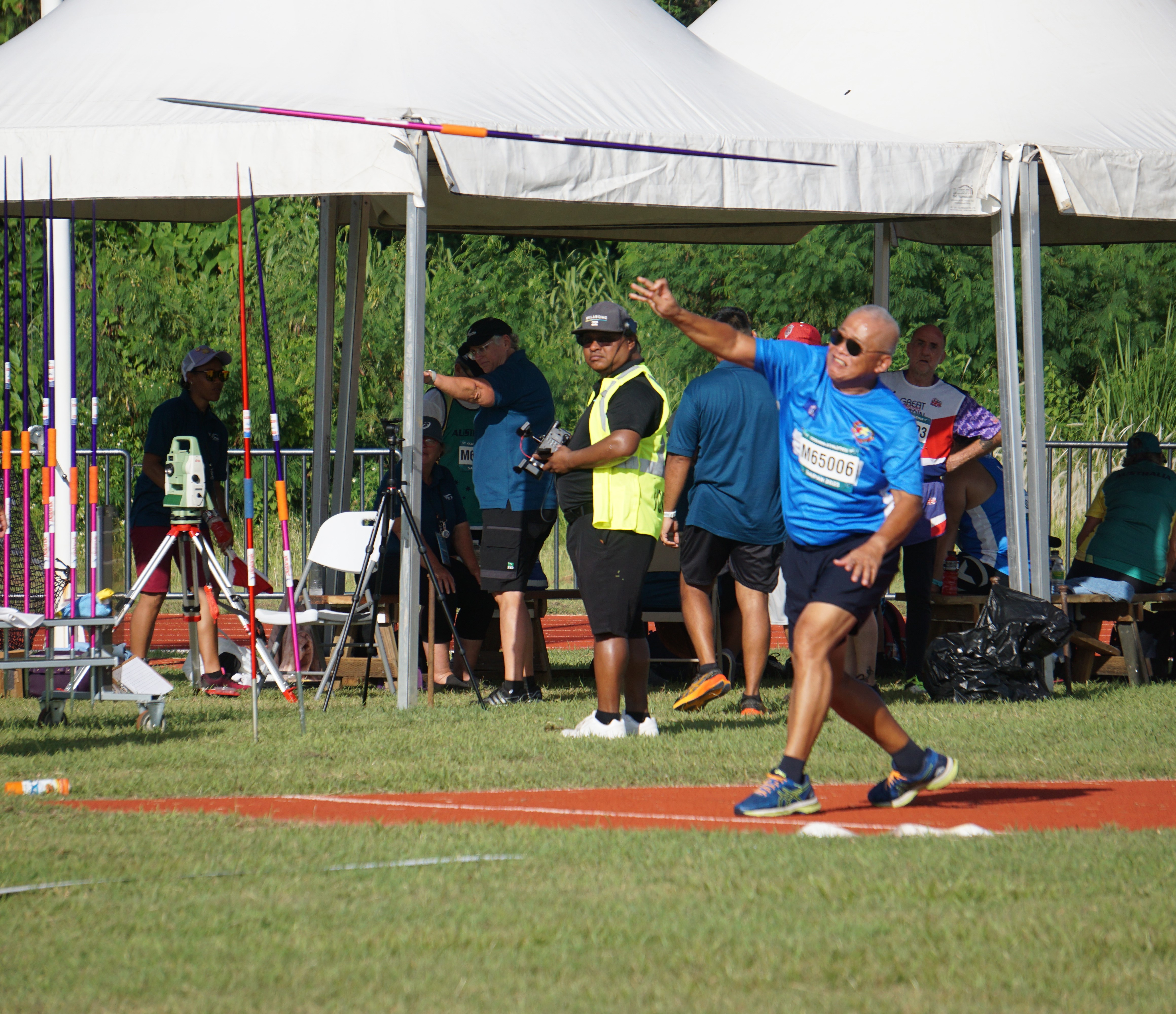 Manny Sitchon throws the javelin.