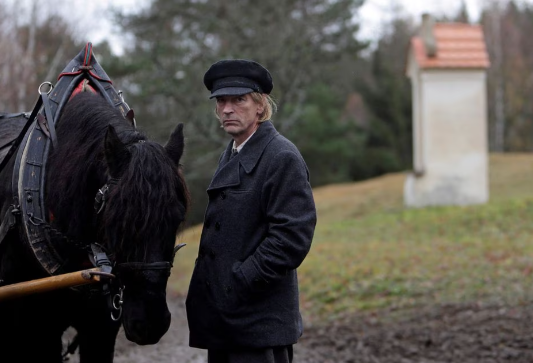 Cast member Julian Sands takes part in the filming of a scene for the movie "Painted Bird" near the village of Boletice, Czech Republic, Nov. 12, 2017.