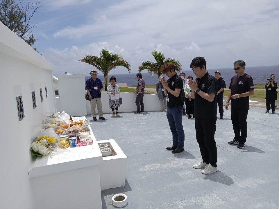 Delegates of the Okinawa Prefectural Assembly of the Micronesian Repatriation Association of Okinawa conduct a memorial service on June 3, 2023, on Tinian, commemorating Okinawans who lost their lives during World War II.