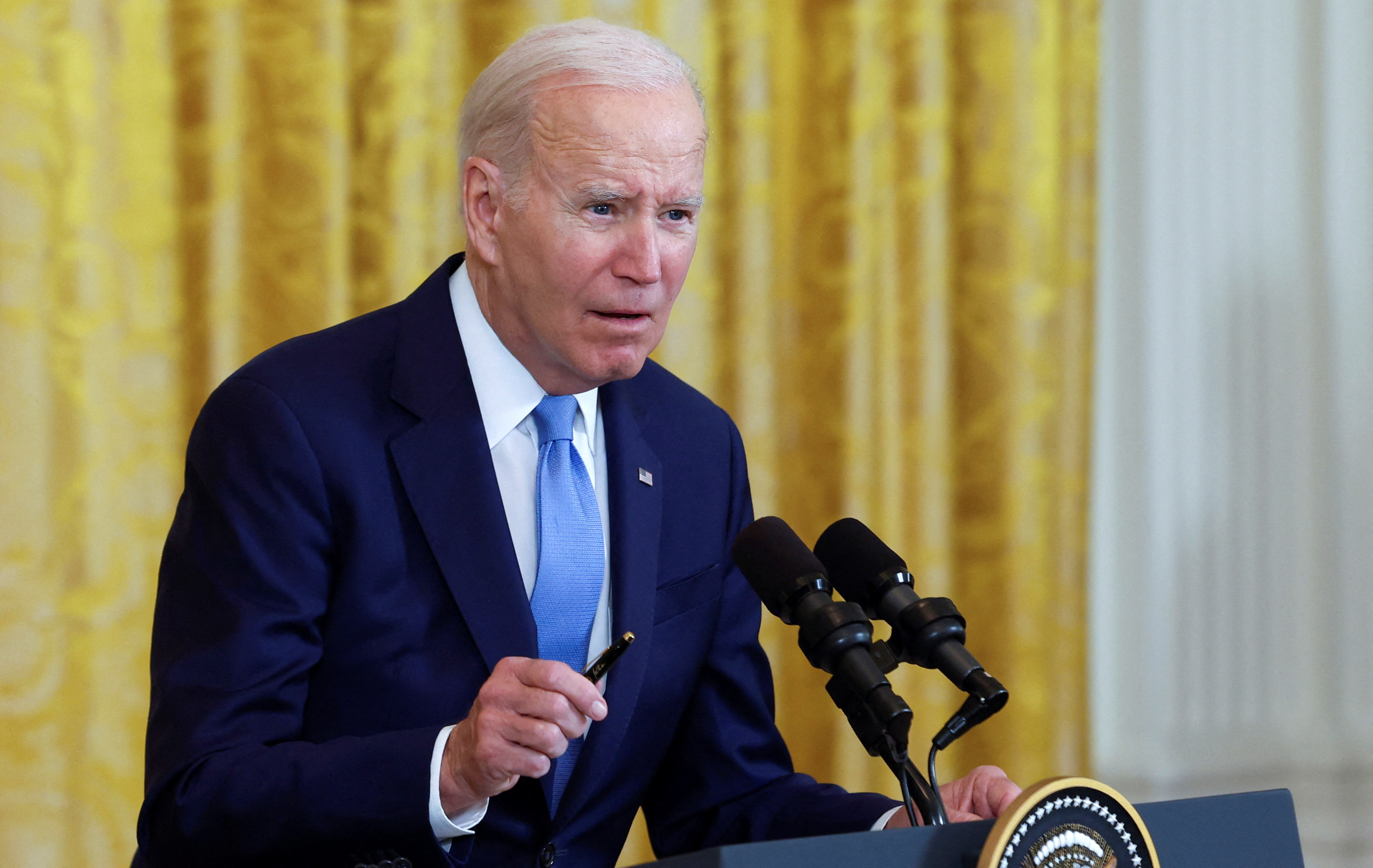 FILE PHOTO: U.S. President Joe Biden answers a question during a joint news conference with Britain's Prime Minister Rishi Sunak in the East Room at the White House in Washington, U.S., June 8, 2023. REUTERS/Evelyn Hockstein