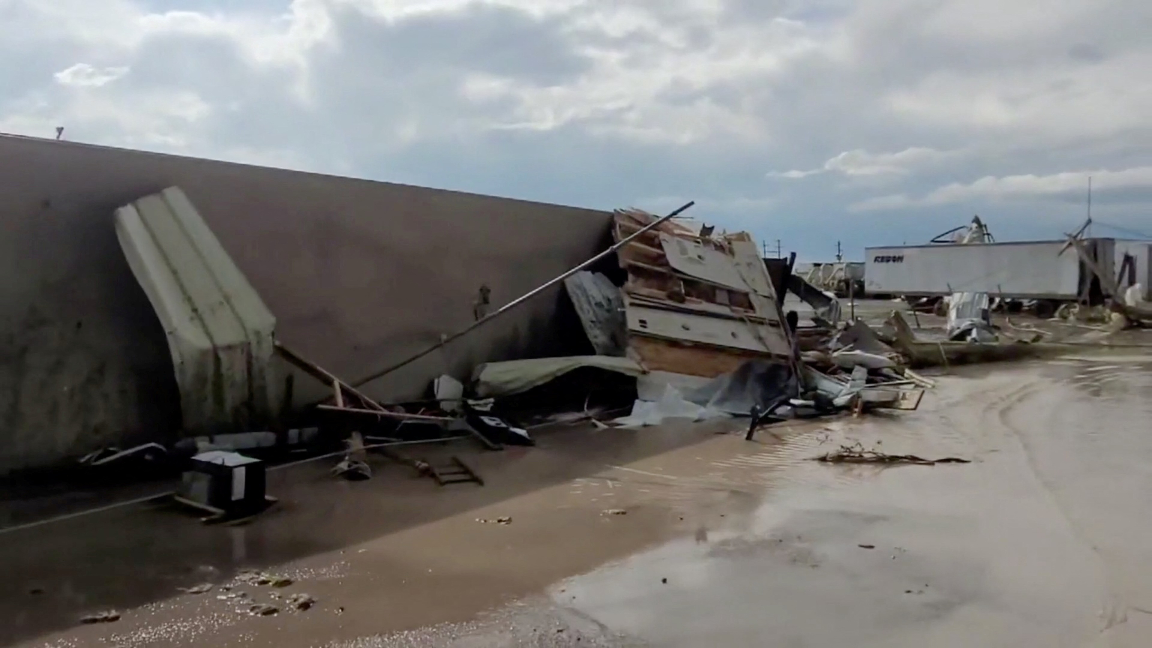 A view of a damaged site in Perryton as the town gets struck by a tornado, in Texas, U.S. June 15, 2023, in this screengrab obtained from a social media video. Sabrina Devers via TMX/via REUTERS