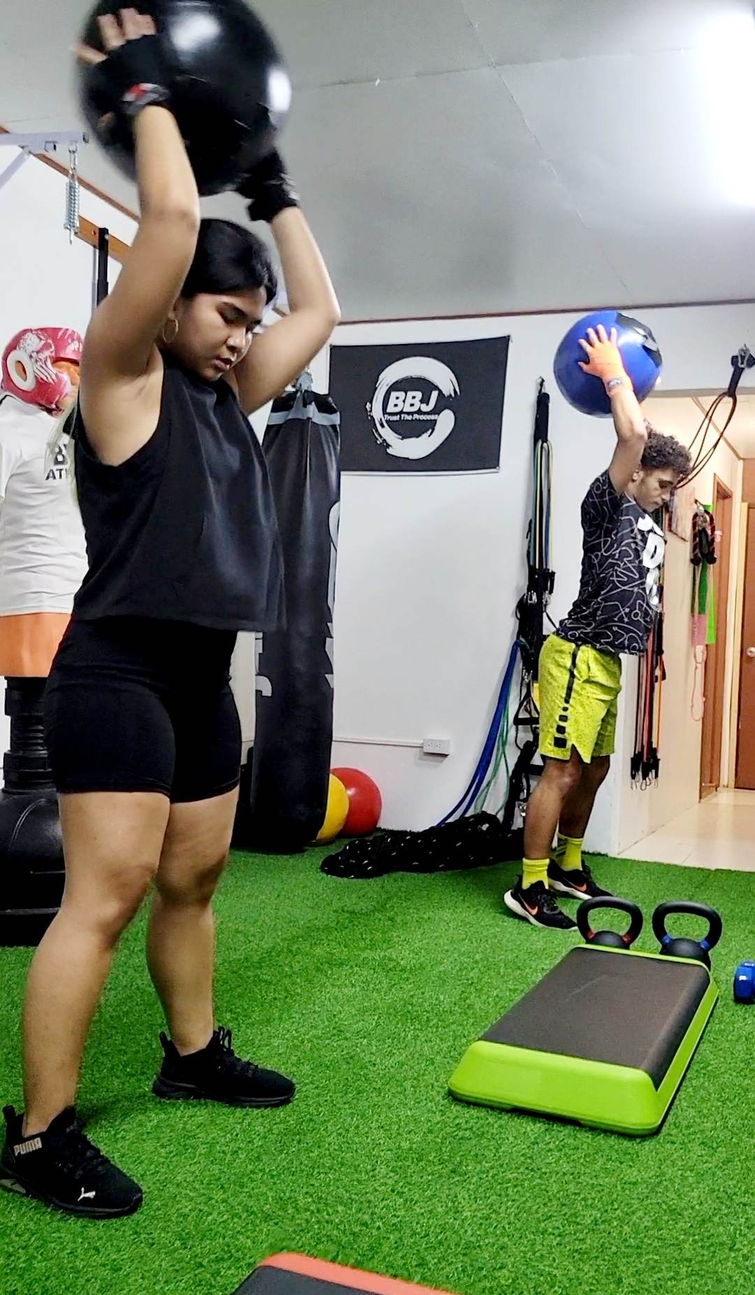 Hana Diaz and Masan Igisomar perform interval circuit training at BBJ Athletics. Contributed photo
