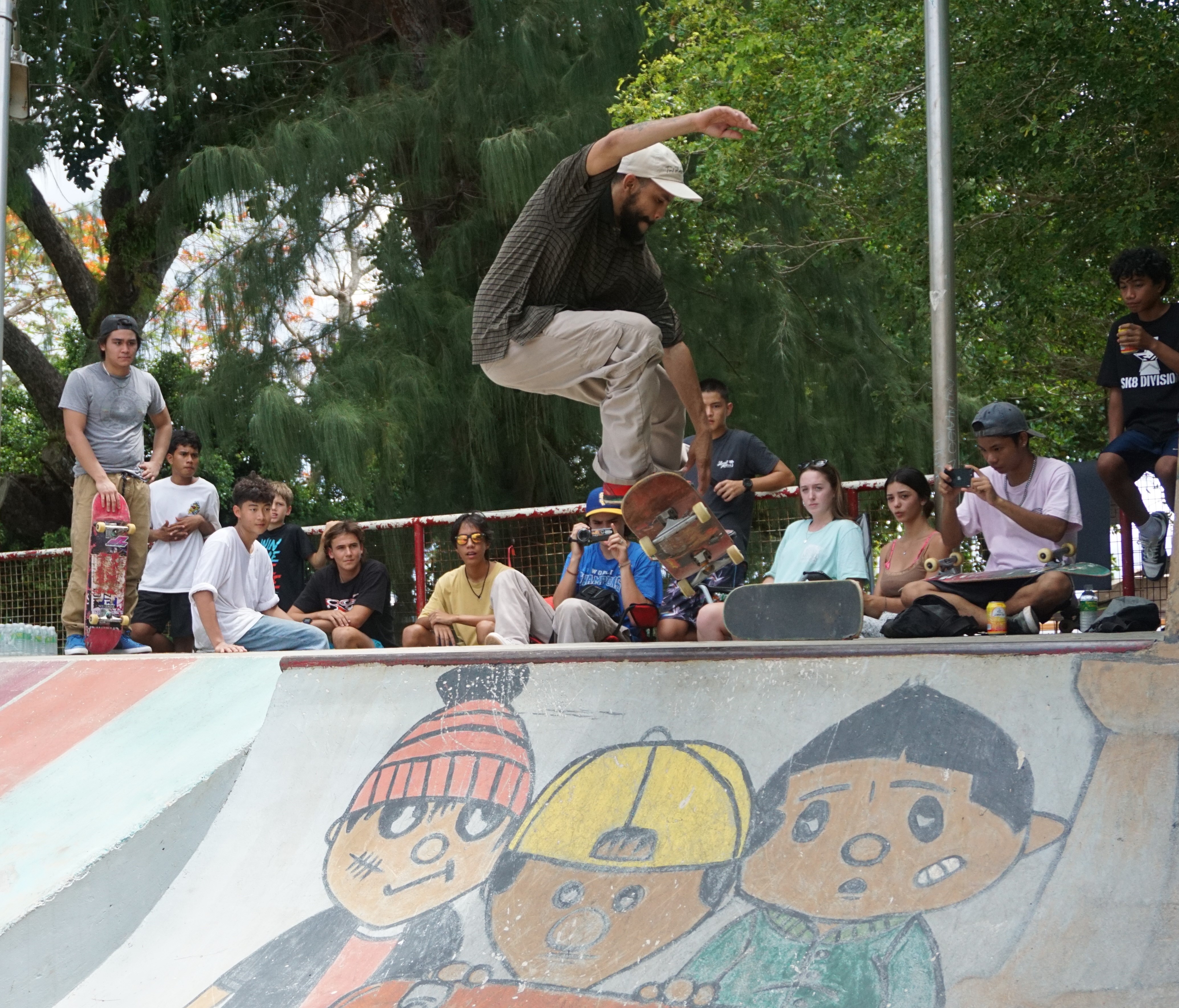 Jimmy Polk scores the ollie grab off the half pipe.