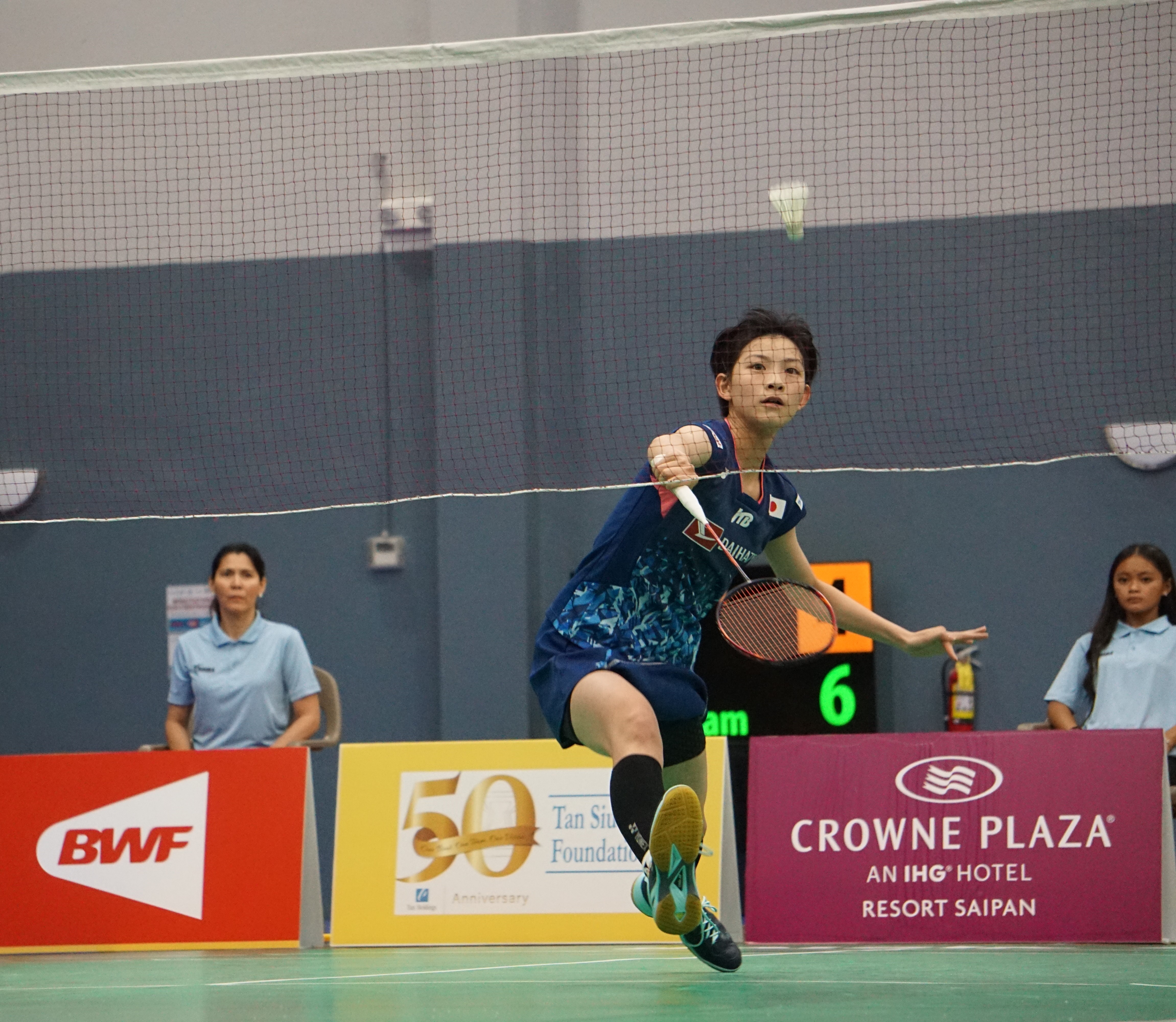 Japan's Tomoka Miyazaki reaches for the backhand return during a game in the Crowne Plaza Northern Marianas Open 2023 at the Ada gym.Photo by James F. Sablan Jr.