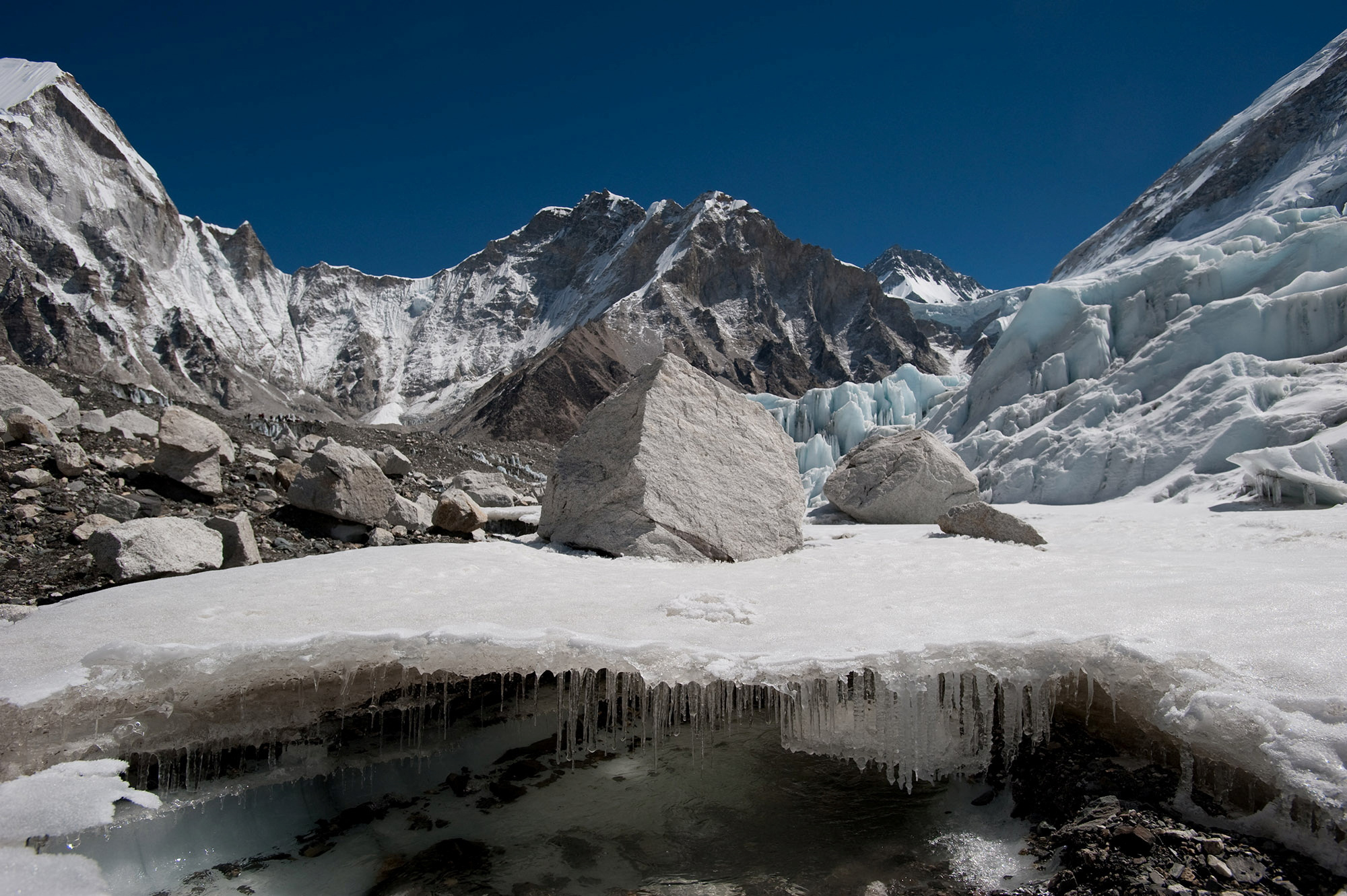 Water forms under Nepal's Khumbu glacier as the ice melts in this undated handout image. Alex Treadway/ICIMOD/Handout via REUTERS