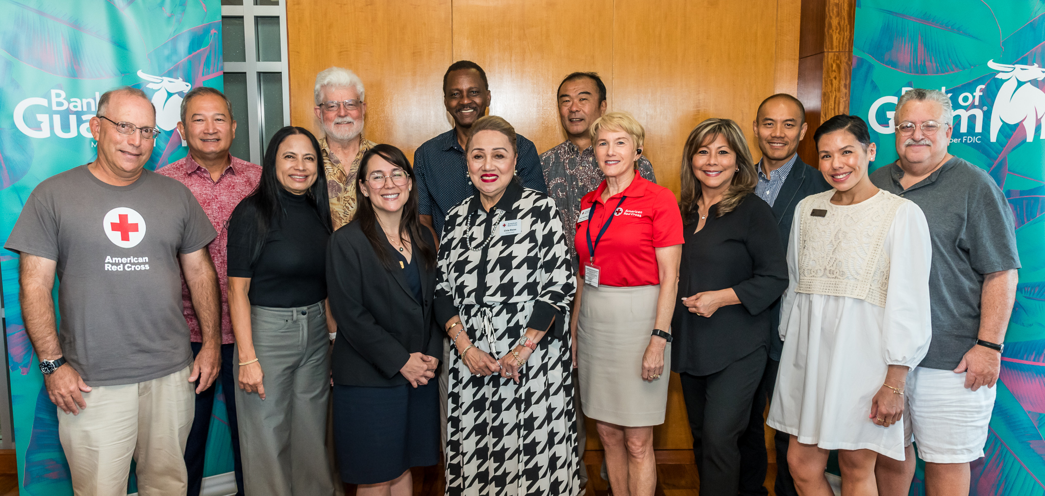 As part of its longstanding commitment and community partnership with the American Red Cross, Bank of Guam donated $50,000 to the American Red Cross Guam Chapter to aid with typhoon relief and recovery efforts. Bank of Guam  President and CEO Joaquin P.L.G. Cook and Executive Vice President and COO Maria Eugenia Leon Guerrero are co-chairing the Typhoon Mawar Fundraising Committee of the American Red Cross. Pictured, from left: John Hirsch, Executive Director, American Red Cross-Northern Mariana Islands Chapter; Ed Ilao, Board Member, ARC Guam Chapter; Annmarie Muna, Board Member, ARC Guam Chapter; Guam First Gentleman Jeff Cook, Board Member, ARC Guam Chapter; Maria Eugenia Leon Guerrero, Executive Vice President and Chief Operating Officer, Bank of Guam; Karvin Flynn, Board Treasurer, ARC Guam Chapter; Chita Blaise, Chief Executive Officer, American Red Cross-Guam Chapter; Mark Tokito, Board Member, ARC Guam Chapter; Diane Peters-Nguyen, Chief Executive  Officer,  American  Red  Cross -Pacific  Islands  Region;  Lucy  Alcorn,  Board  Member,  ARC  Guam Chapter; Marcos Fong, Chairman of the Board, ARC Guam Chapter; Lesley-Anne Leon Guerrero, Senior Vice President and Chief Experience Officer, Bank of Guam; and Robert Marks, Board Member, ARC Guam Chapter.