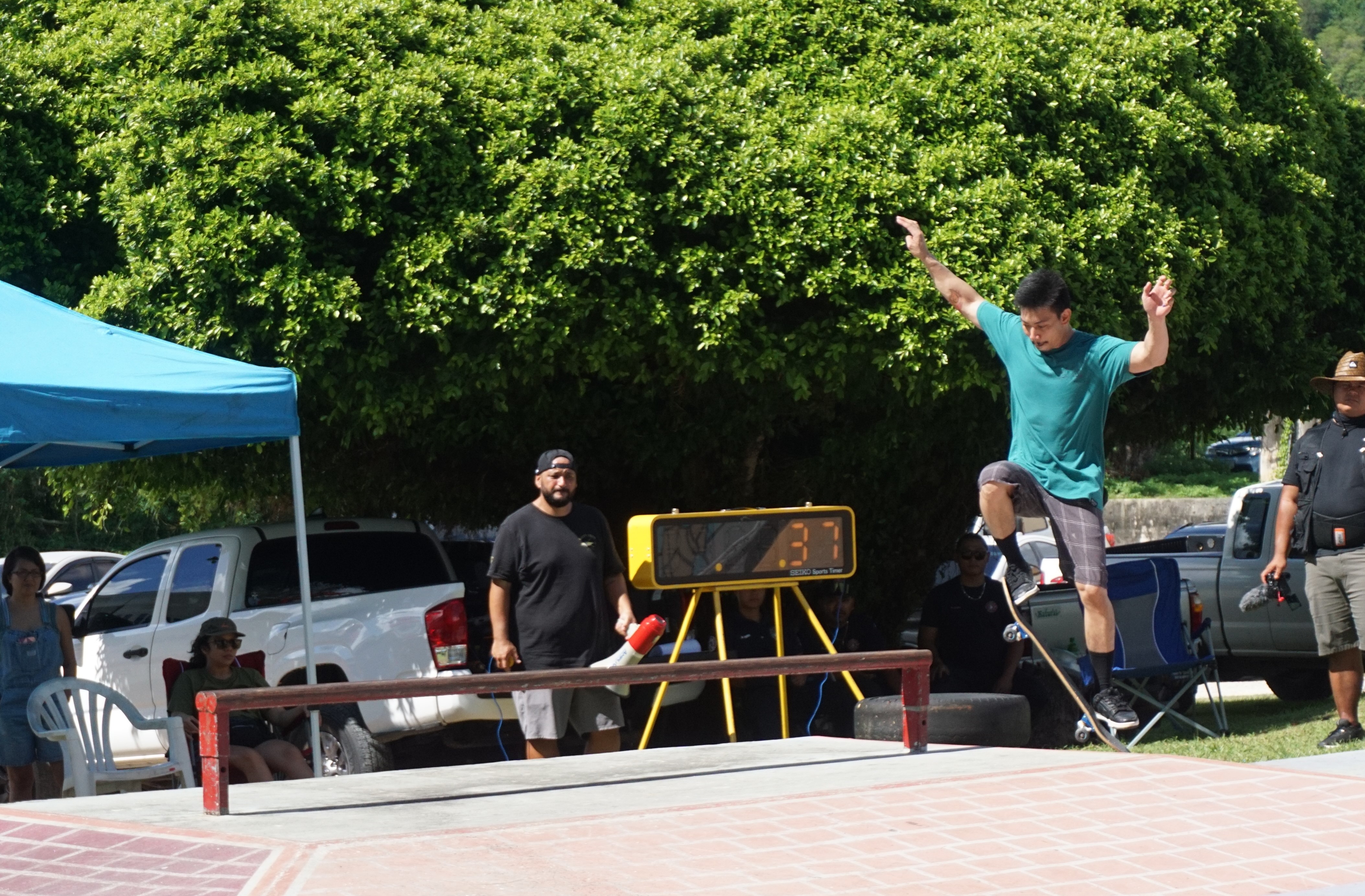 Alfredo Guevarra attempts to leap onto the rail.
