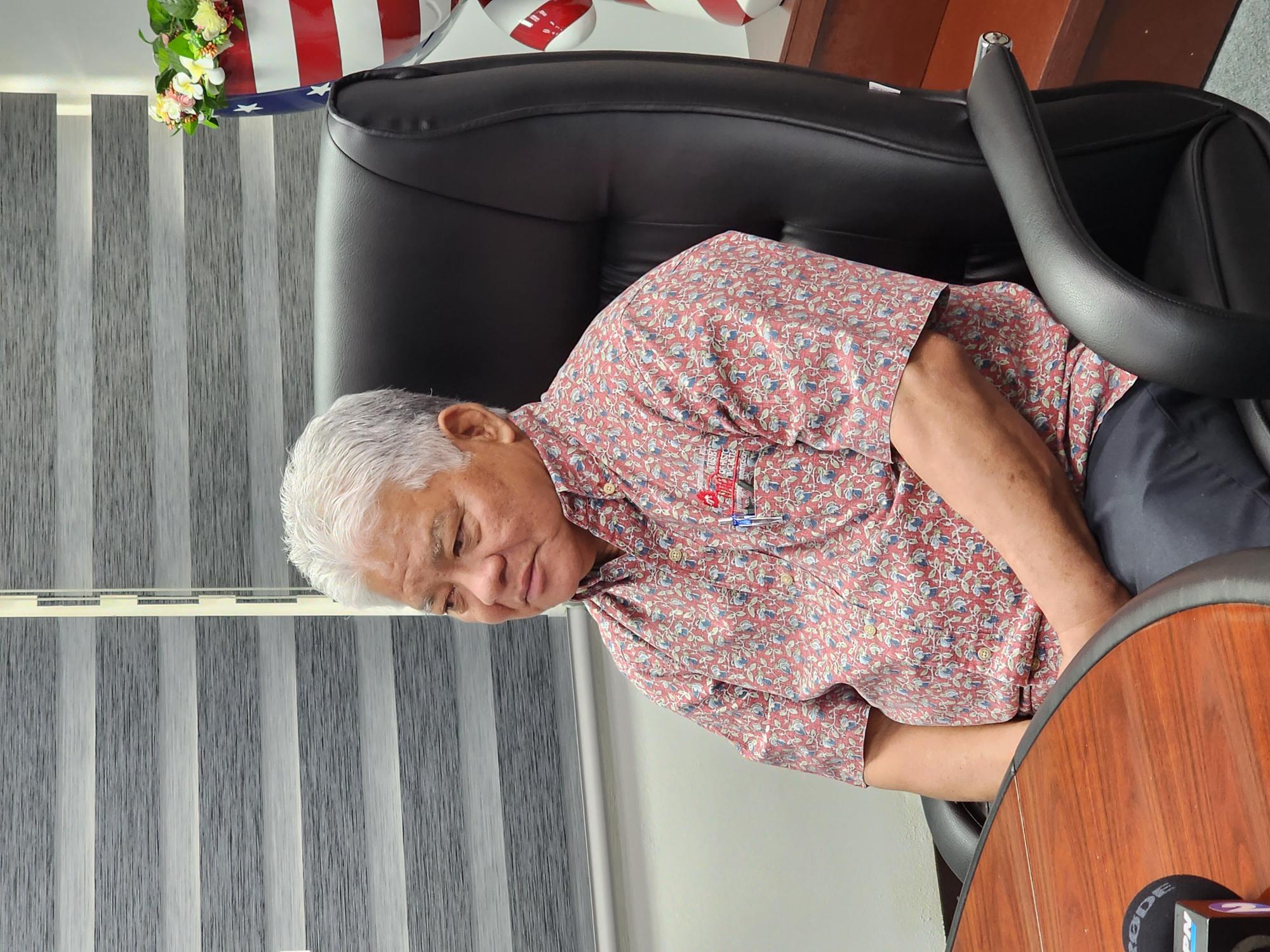 Gov. Arnold I. Palacios listens to a reporter’s question during an interview at his office, Tuesday.   