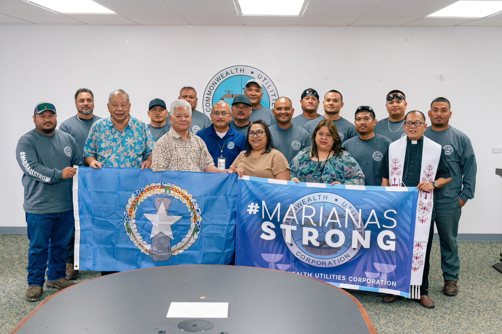 On Friday afternoon, Governor Arnold I. Palacios and Lt. Governor David Apatang joined Commonwealth Utilities Corporation Board Chair Janice Tenorio and acting Executive Director Betty Terlaje in meeting with, and providing encouragement to the CUC power line crew members who will be traveling to Guam this weekend to assist the Guam Power Authority with power restoration efforts on Guam. Governor Palacios and Lt. Governor Apatang thanked the crew of 12 for their service and offered support while they are away. The line crew also received a blessing from Father Rey Rosal. According to CUC, power restoration efforts have already been completed on Rota; water services were also restored.