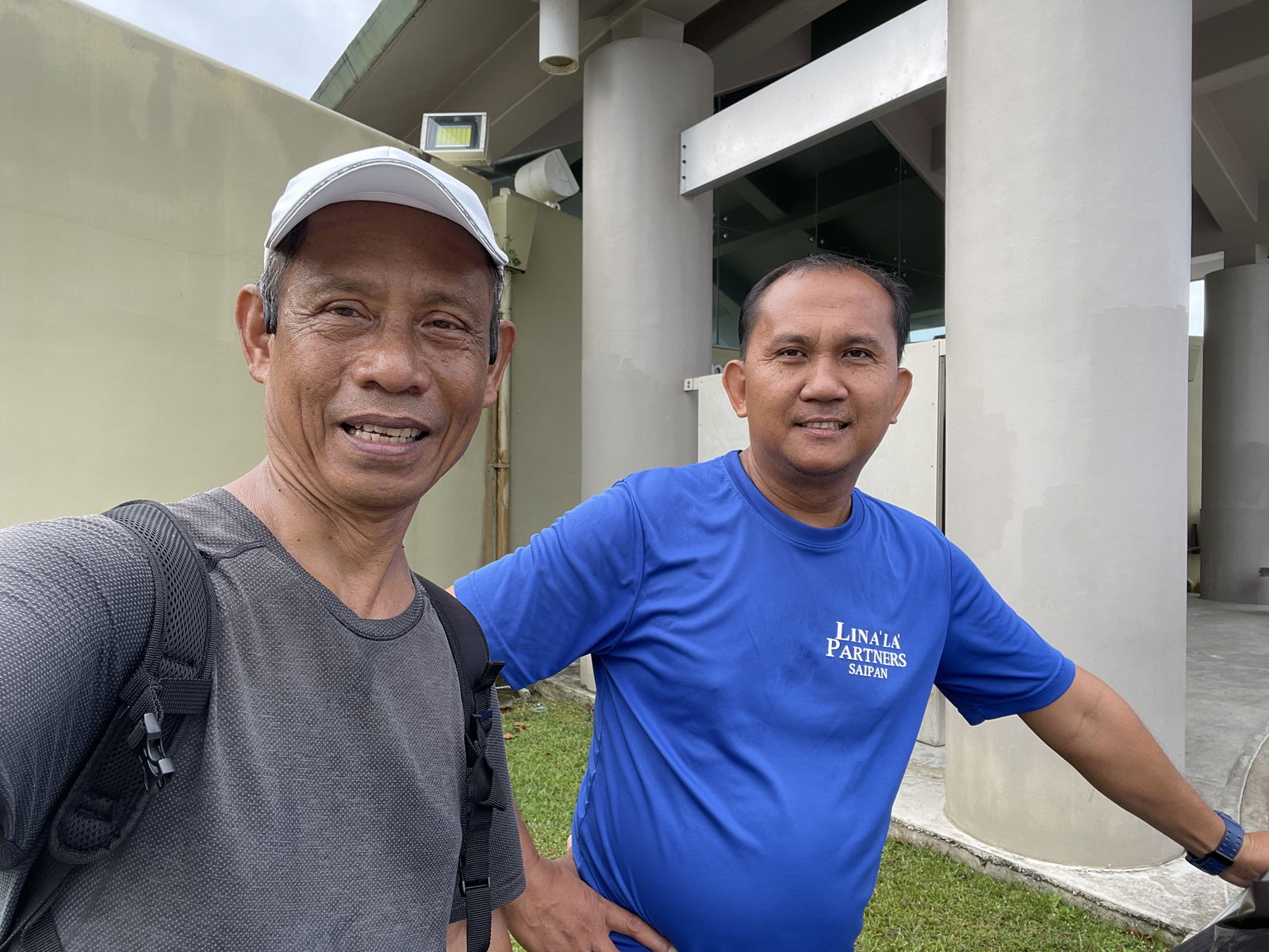 Aniceto Iglesias, right, found Pastor Ed Lloren’s wallet on Sunday in the American Memorial Park tennis court parking lot.