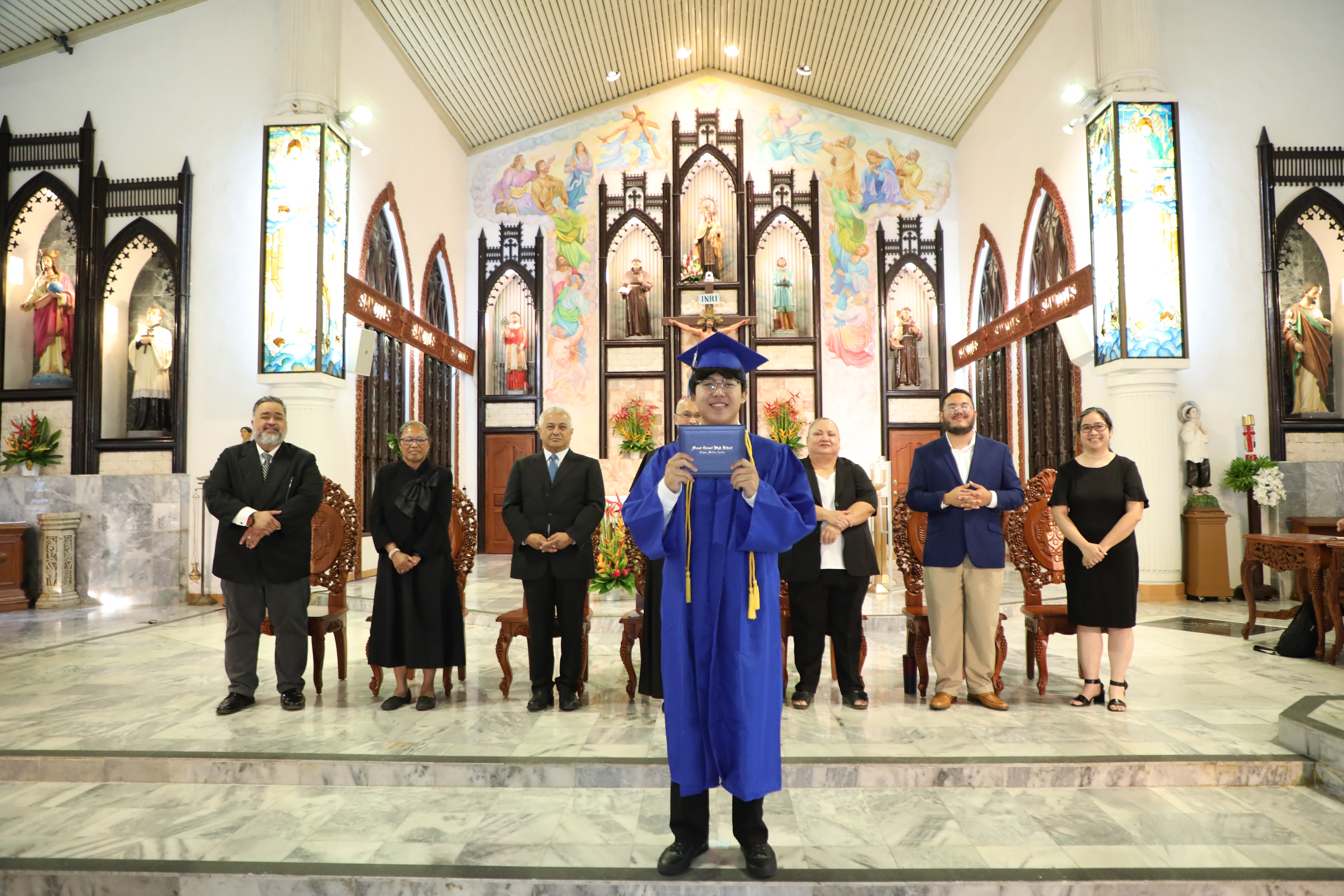 Mount Carmel School student Dohyun Lim receives his diploma during the school’s 12th-Grade Commencement Ceremony on June 03, 2023.