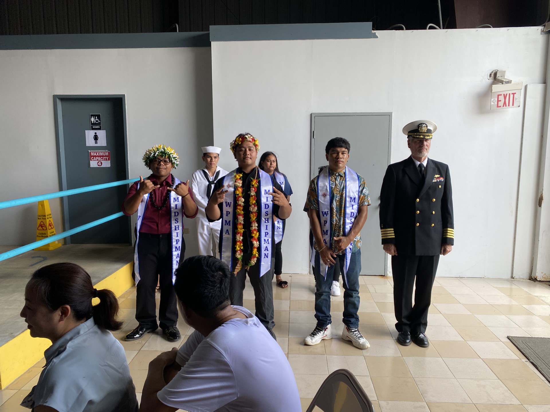 From left, Marvin Reyes of Kagman High School, Michael Tomokane, also of KHS, Landon Delos Reyes of Da’ok Academy and Capt. Michael Bacher of the Western Pacific Marine Academy. Back row, from left, Tristan Manglona and Anita Perez of Da’ok Academy.