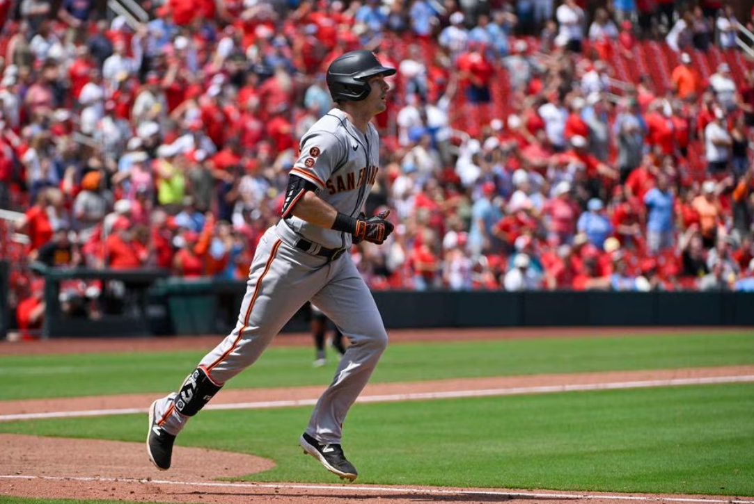 San Francisco Giants center fielder Mike Yastrzemski (5) hits a game tying two run home run against the St. Louis Cardinals during the ninth inning at Busch Stadium in St. Louis, Missouri,  June 14, 2023.