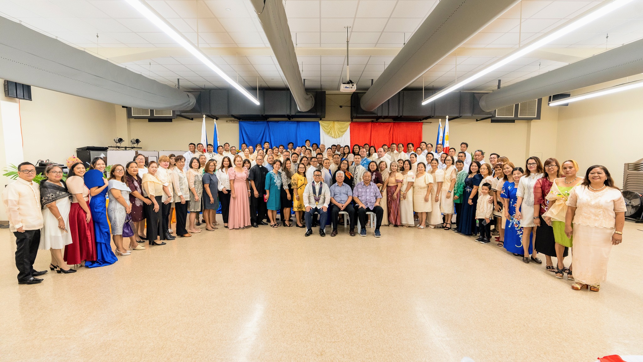 Officers and representatives of various Filipino organizations in the Northern Marianas pose for a photo with Philippine Consul to Guam Ferdinand P. Flores and CNMI officials led by Gov. Arnold I. Palacios and Lt. Gov. David M. Apatang during the 125th Philippine Independence Day celebration in the Marianas High School cafeteria on Monday.