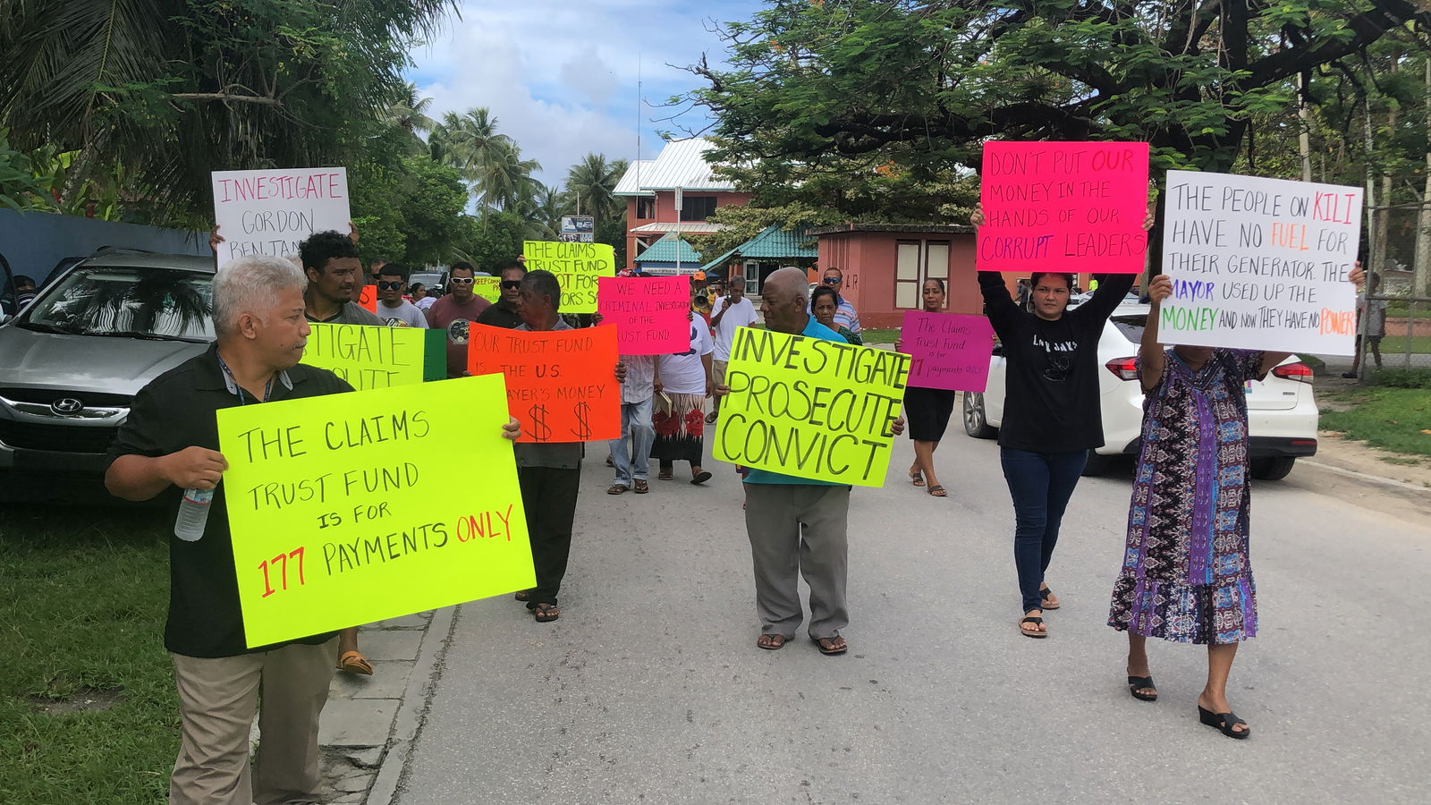 Displaced Bikini Islanders marched on the U.S. Embassy in Majuro in early June to voice their anger over what they say is misuse of the Bikini Resettlement Trust Fund by island leaders.