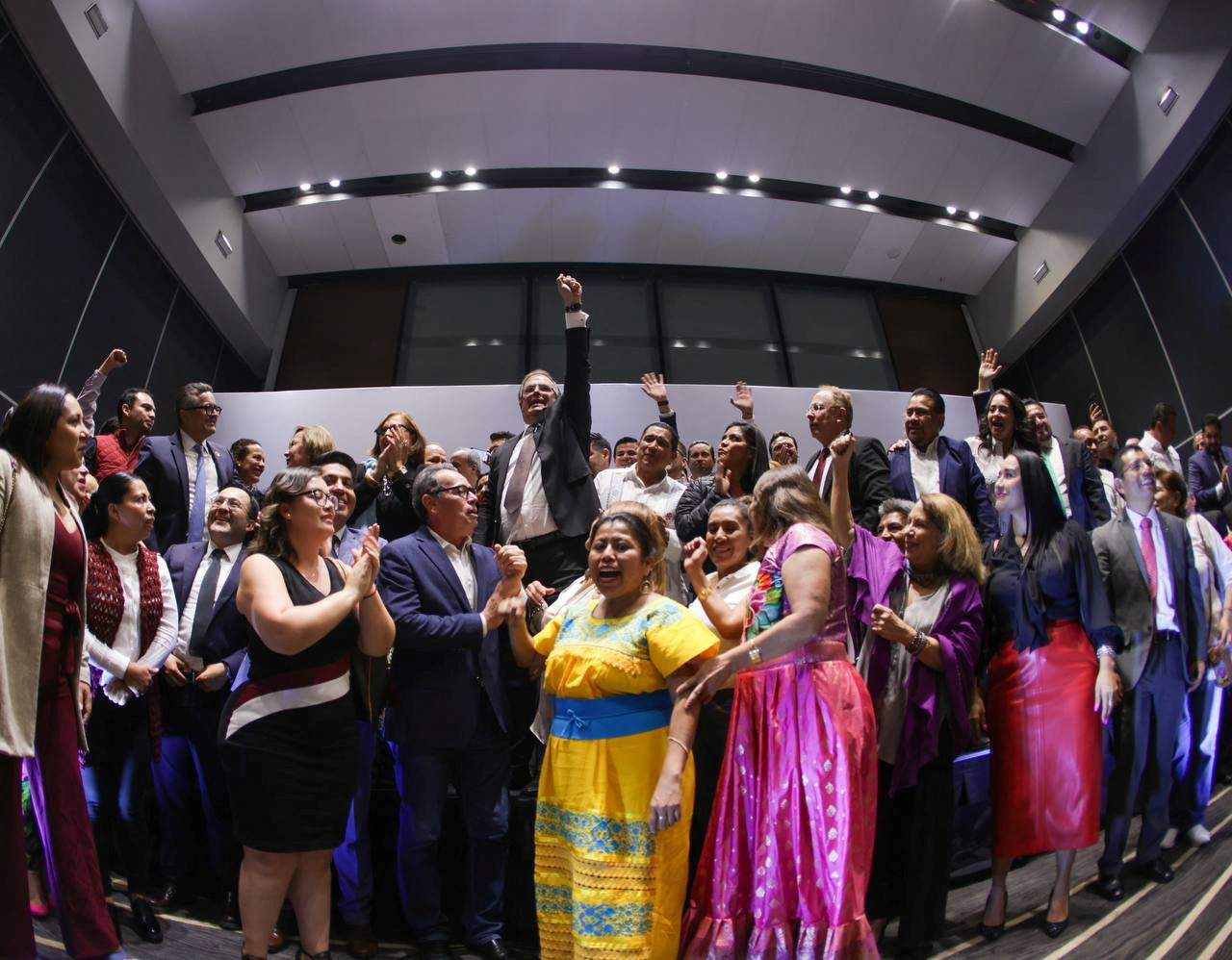 Mexican Foreign Minister Marcelo Ebrard raises his fist while announcing he will resign next week to focus on winning the nomination of the leftist National Regeneration Movement (MORENA) ruling party for next year's presidential election, at a hotel in Mexico City, Mexico, June 6, 2023. Mexico Ministry of Foreign Affairs/Handout via REUTERS