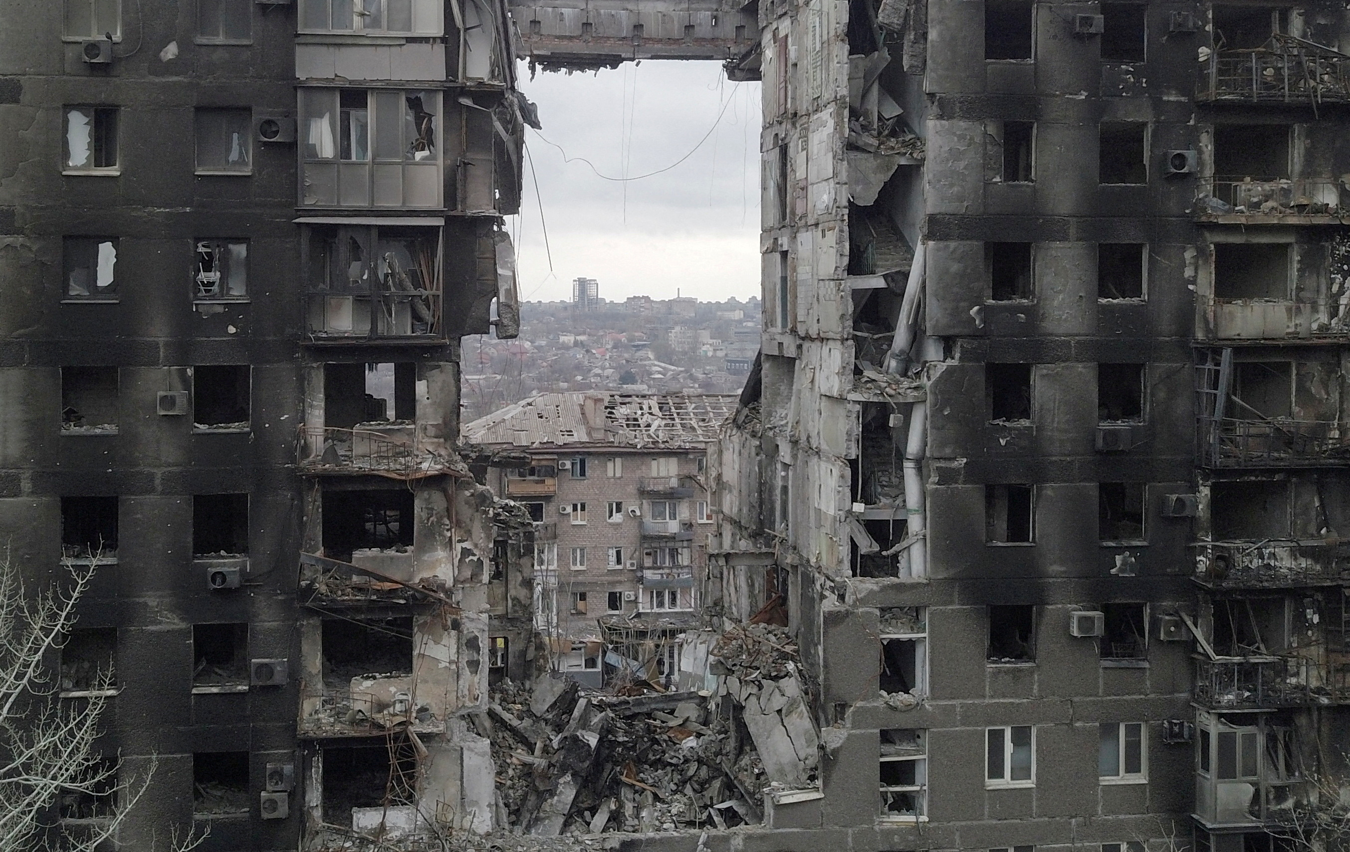 FILE PHOTO: A view shows a residential building destroyed in the course of Ukraine-Russia conflict in the southern port city of Mariupol, Ukraine April 14, 2022. Picture taken with a drone. REUTERS/Pavel Klimov/File Photo