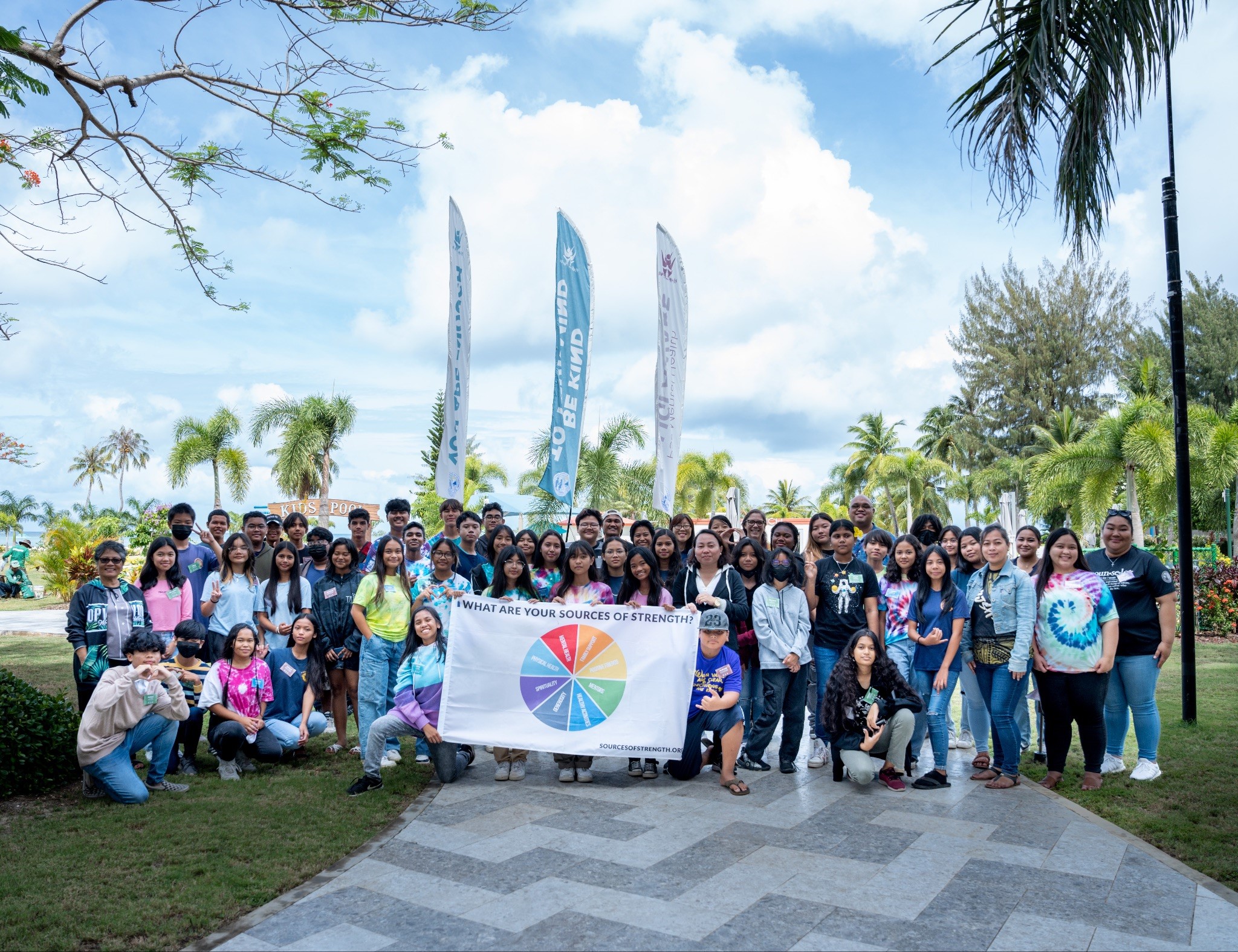 Sources of Strength peer leaders and advisors pose for a photo with the PSS Mental Health Team.