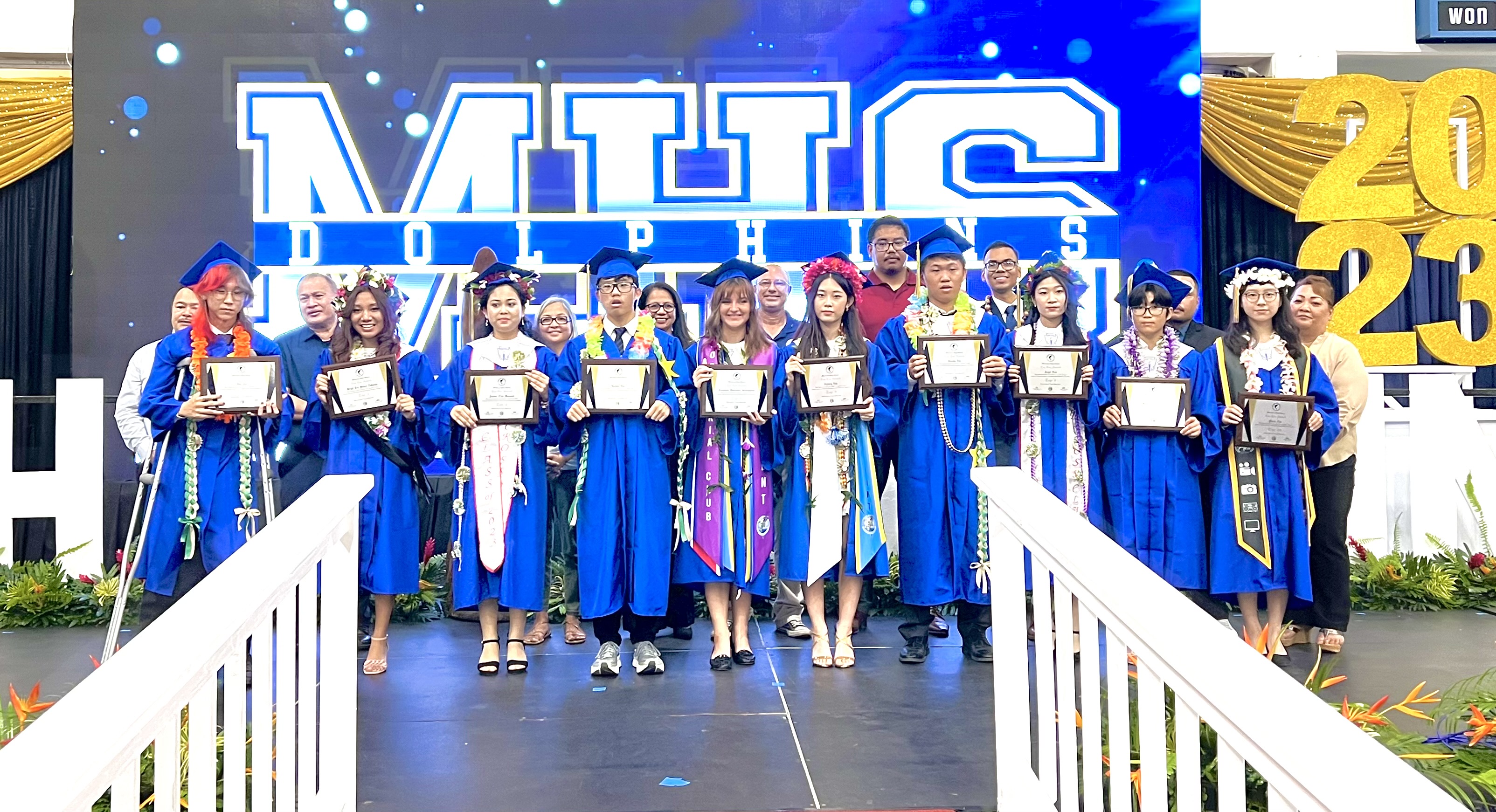The top 10 graduates of Marianas High School’s Class of 2023: One An, Brigit Len Yumul Tabuena, Amena Zhai Mahmud, Jaehoon Son, Anastasia Danilovna Shamanaeva, Sydney Lim, Carson Lin, Angel Ren, Katie Eun-bi Choi, and Yiwen “Wendy” Zha. Also in photo, back row, are Board of Education Chairman Antonio L. Borja, Secretary/Treasurer Gregory Pat Borja, BOE Member Maisie B. Tenorio, BOE Member Andrew L. Orsini, Teacher Representative Dr. Dora B. Miura, Commissioner of Education Dr. Alfred B. Ada, Associate Commissioner Eric Magofna, MHS Principal Jonathan Aguon, Vice Principals Melanie Sablan-Rdiall, Preston Basa and Romolo Orsini.