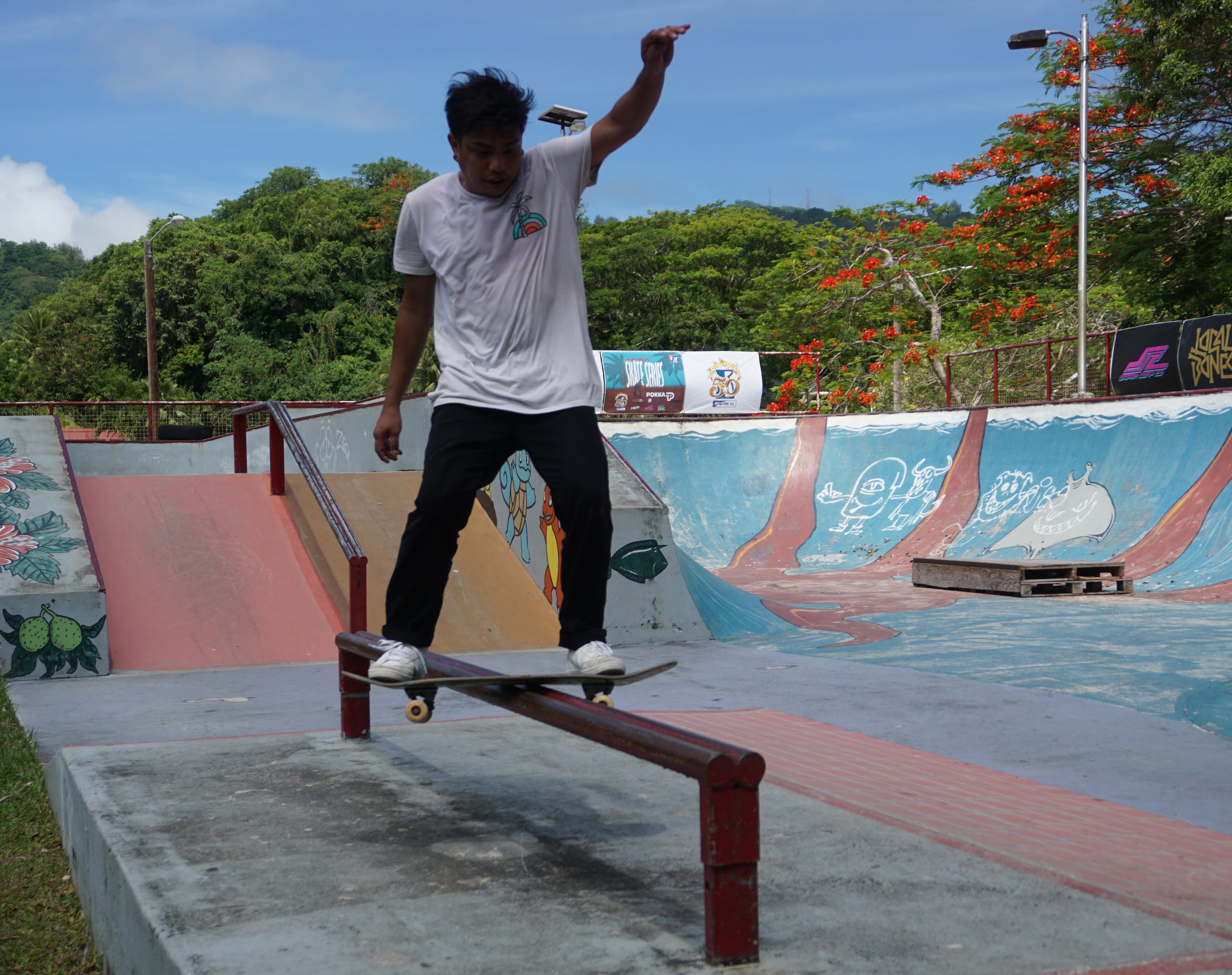 Kevin Codog successfully grinds the rail.