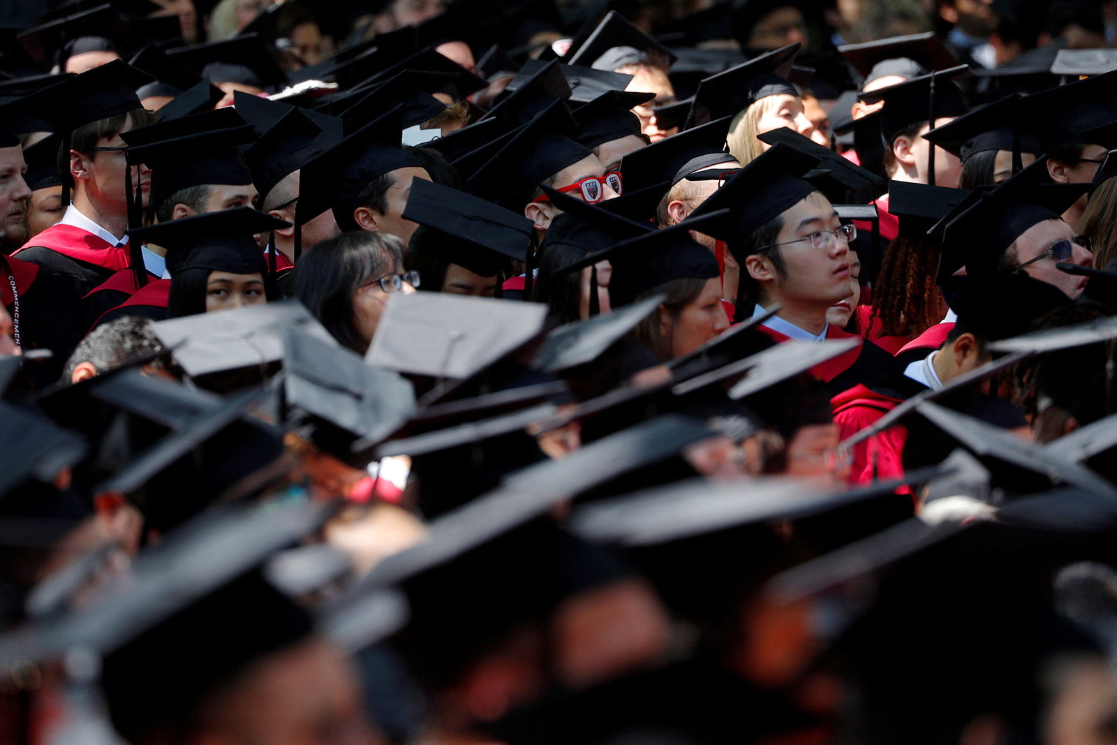 Students attend the 367th Commencement Exercises at Harvard University in Cambridge, Massachusetts, May 24, 2018. 