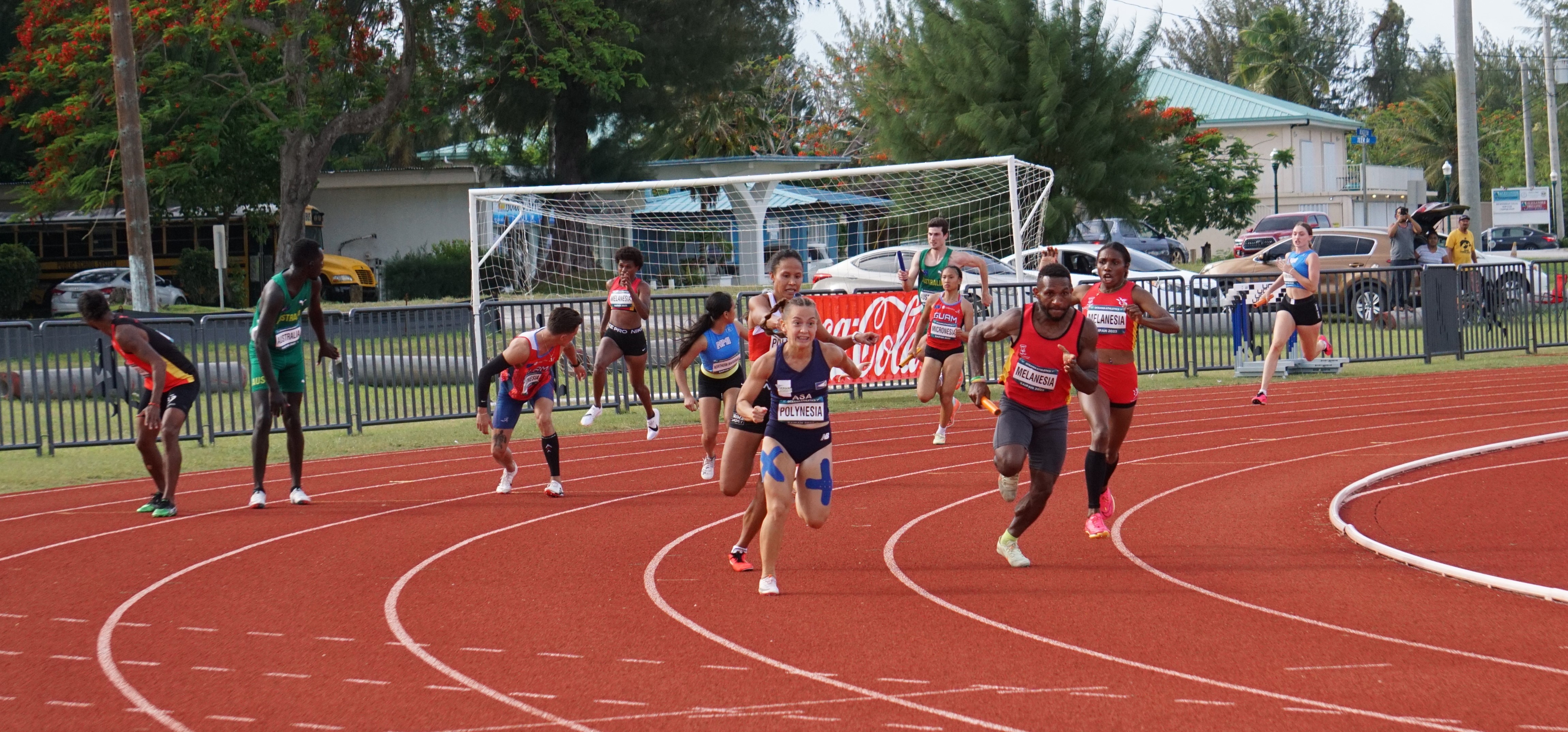 Melanesia and Polynesia runners take off during the final leg of the mixed 4x100 meter relay event of the 2023 Oceania Cup at the Oleai Sports Complex Oval track and field on Saturday.