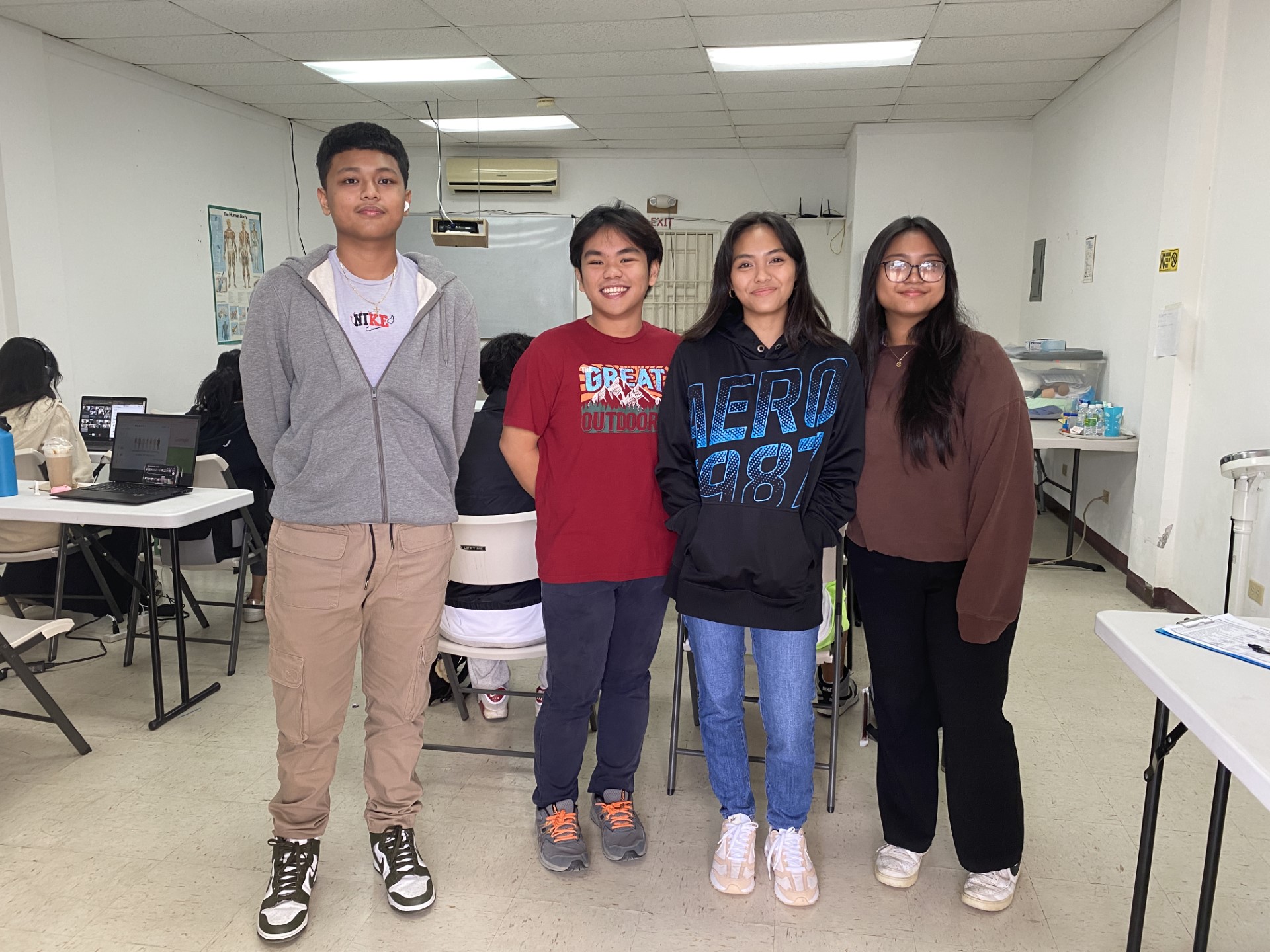 From left, Joshua Revillame of MHS; John Apit, a recent MHS graduate; Joann Garcia, SSHS; and Elisha Valdez, MHS, pose for a photo at the Guam Marianas Training Center in San Jose, Saipan.