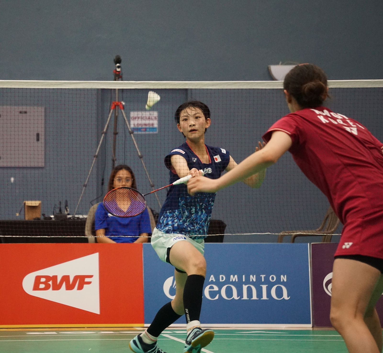 Tomoka Miyazaki reaches for the return near the net during her match against Kim Ga Ram for the women's singles title of the TakeCare Saipan International 2023  on Sunday at the Ada gym.