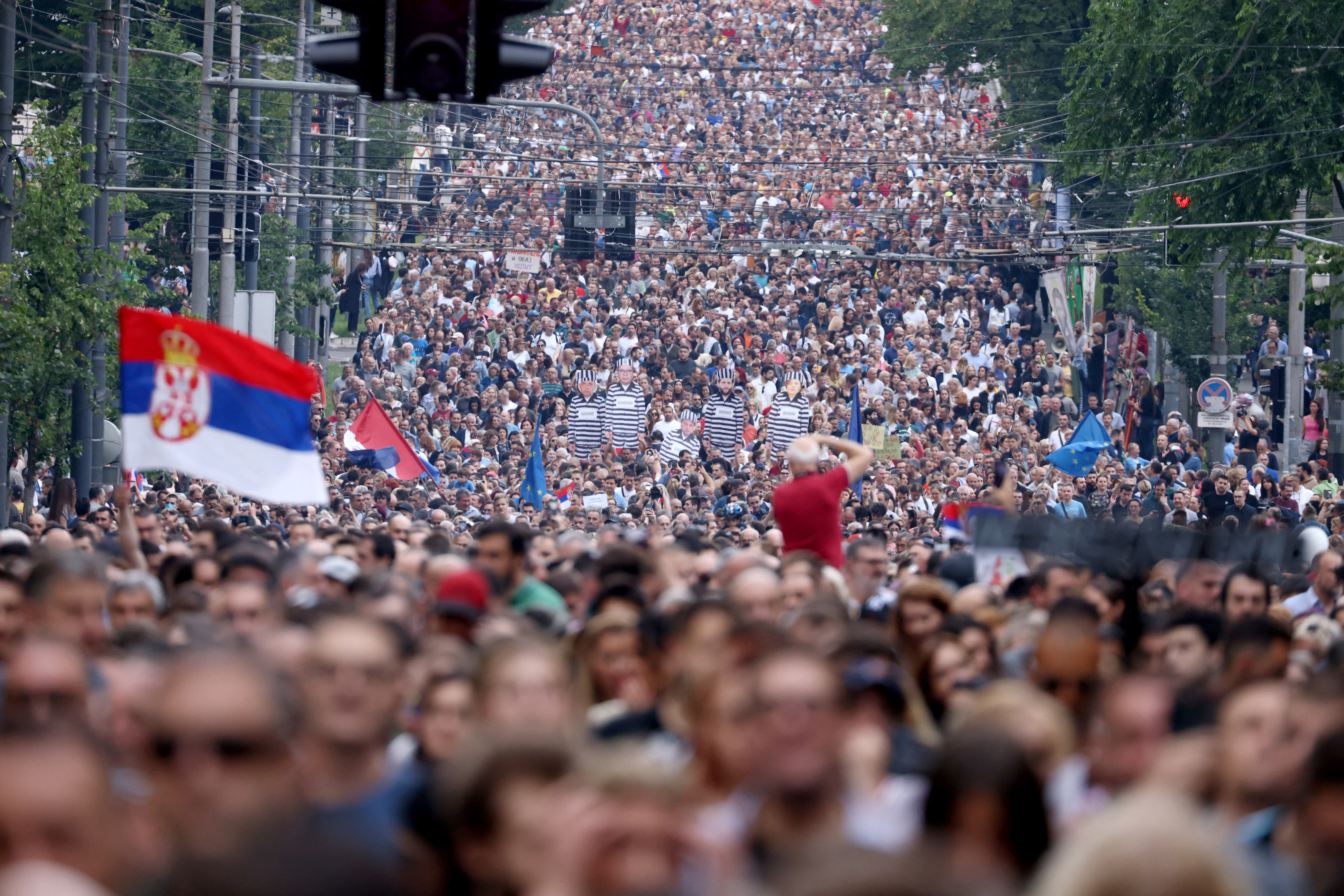 People attend a demonstration "Serbia against violence" organized by Serbia's opposition parties in reaction to the two mass shootings in the same week, in Belgrade, Serbia, June 17, 2023. REUTERS/Marko Djurica