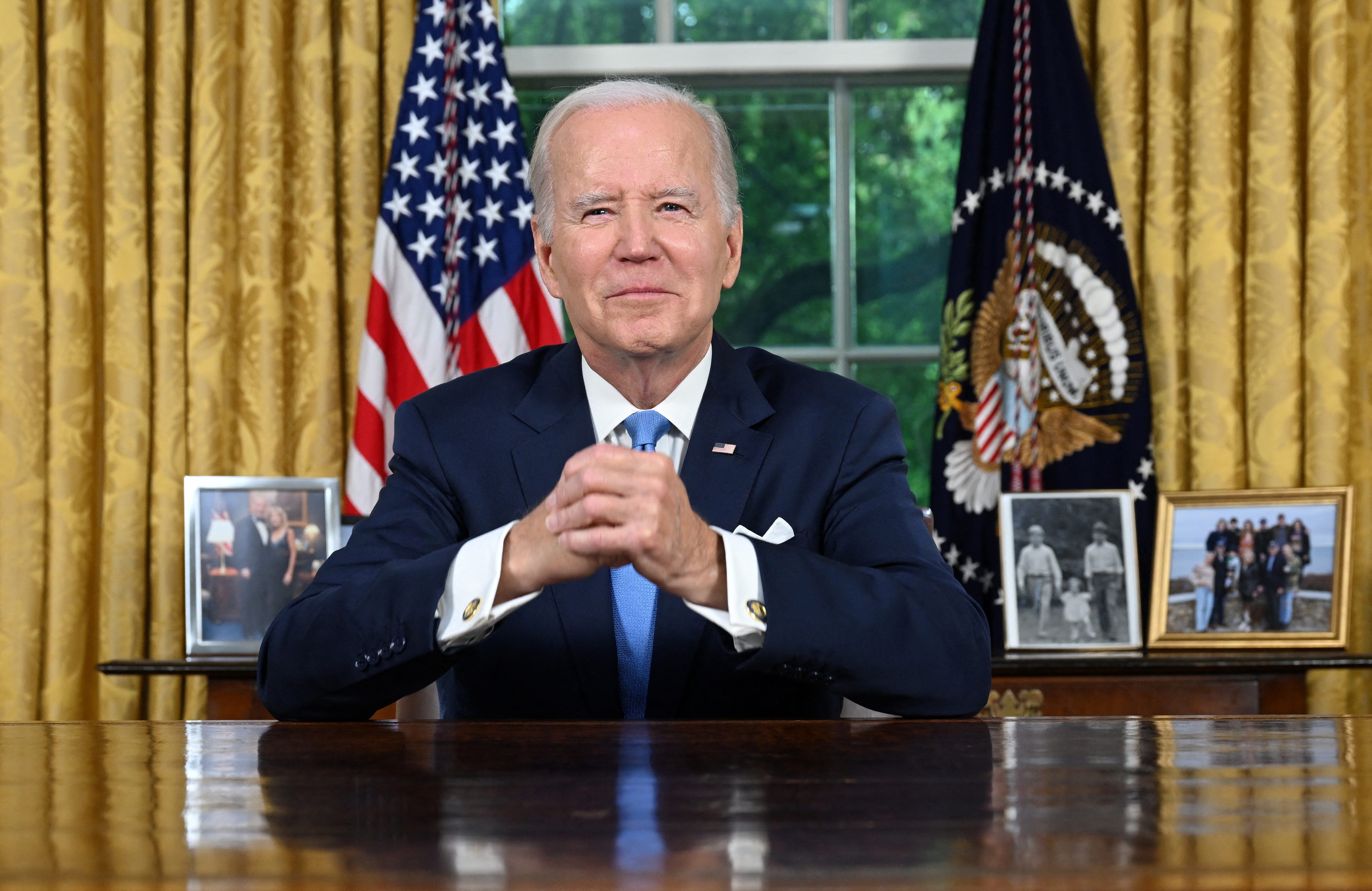 US President Joe Biden addresses the nation on averting default and the Bipartisan Budget Agreement, in the Oval Office of the White House in Washington, DC, June 2, 2023. JIM WATSON/Pool via REUTERS