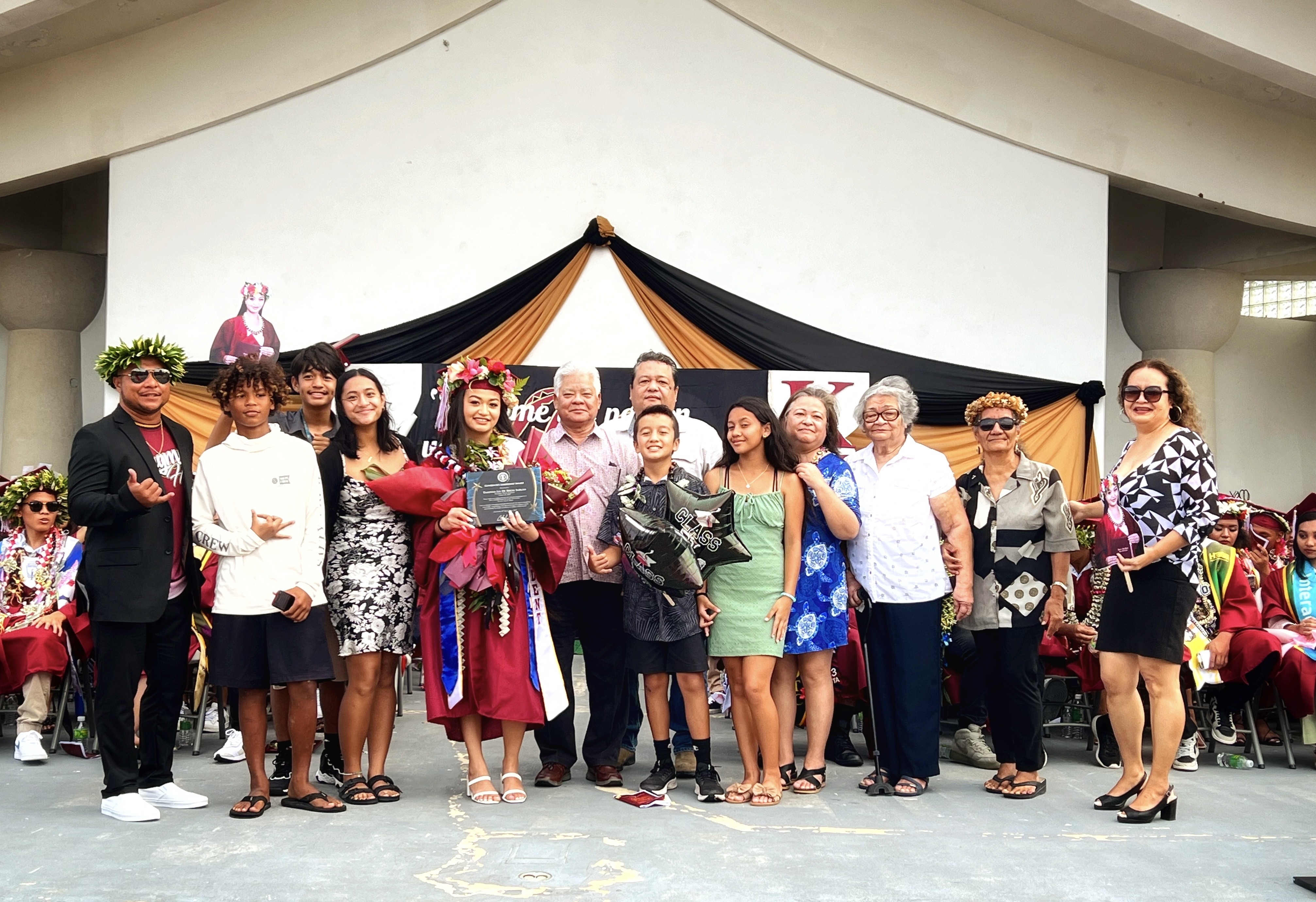 The Governor’s Leadership Award recipient Taisha Lia De Brum Sablan and her family with Gov. Arnold I. Palacios.
