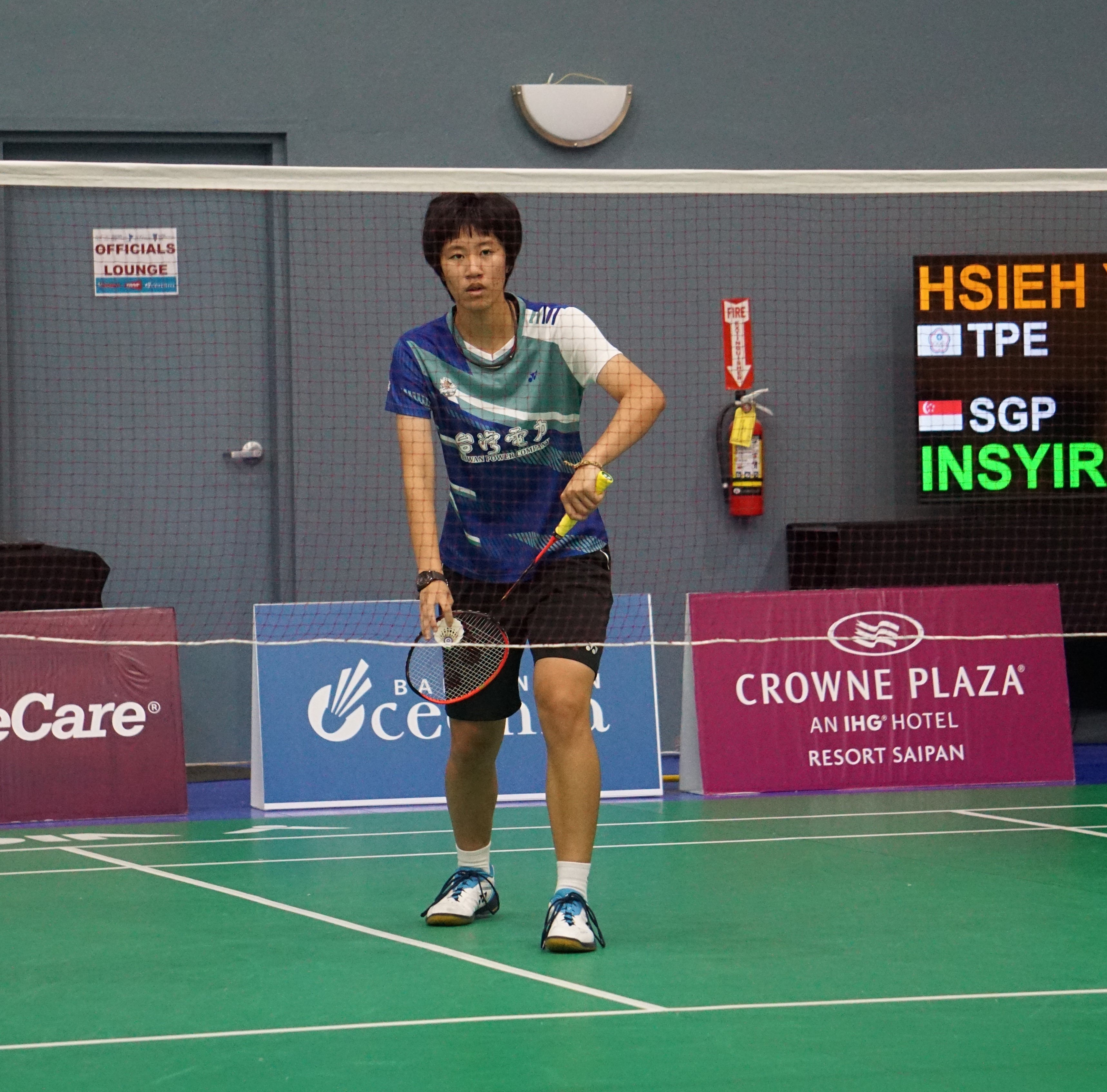 Chinese-Taipei's Yi En Hsieh sets up for a serve against Singapore's Insyirah Khan during their women's singles match in the Crowne Plaza Northern Marianas Open at the Ada gym.