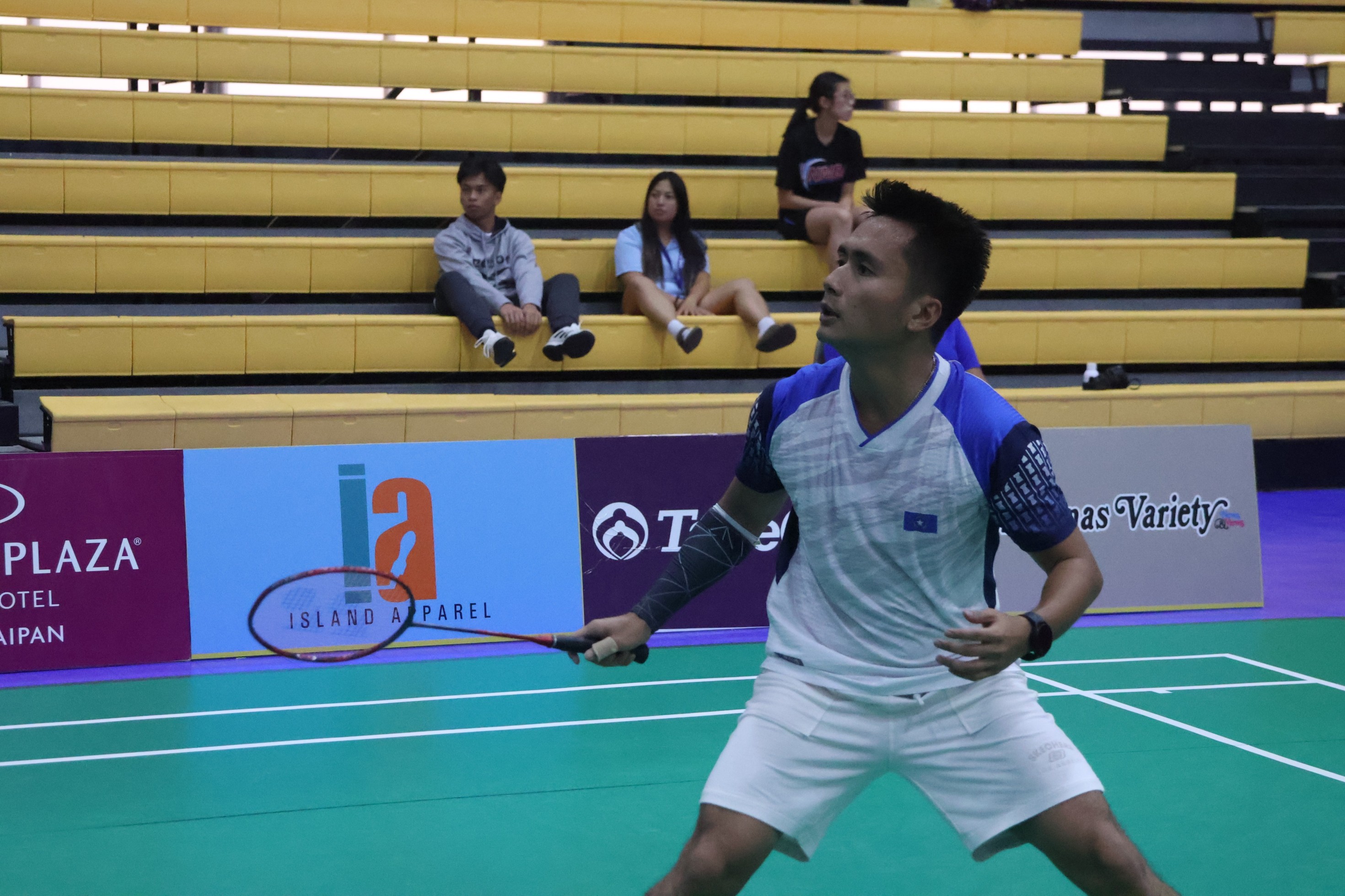 The NMI's Andreau Galvez gathers for the return during his men's singles match against Chinese Taipei’s Chen Chi Ting in round 2 of TakeCare Saipan International 2023 Wednesday at the Ada gym.
