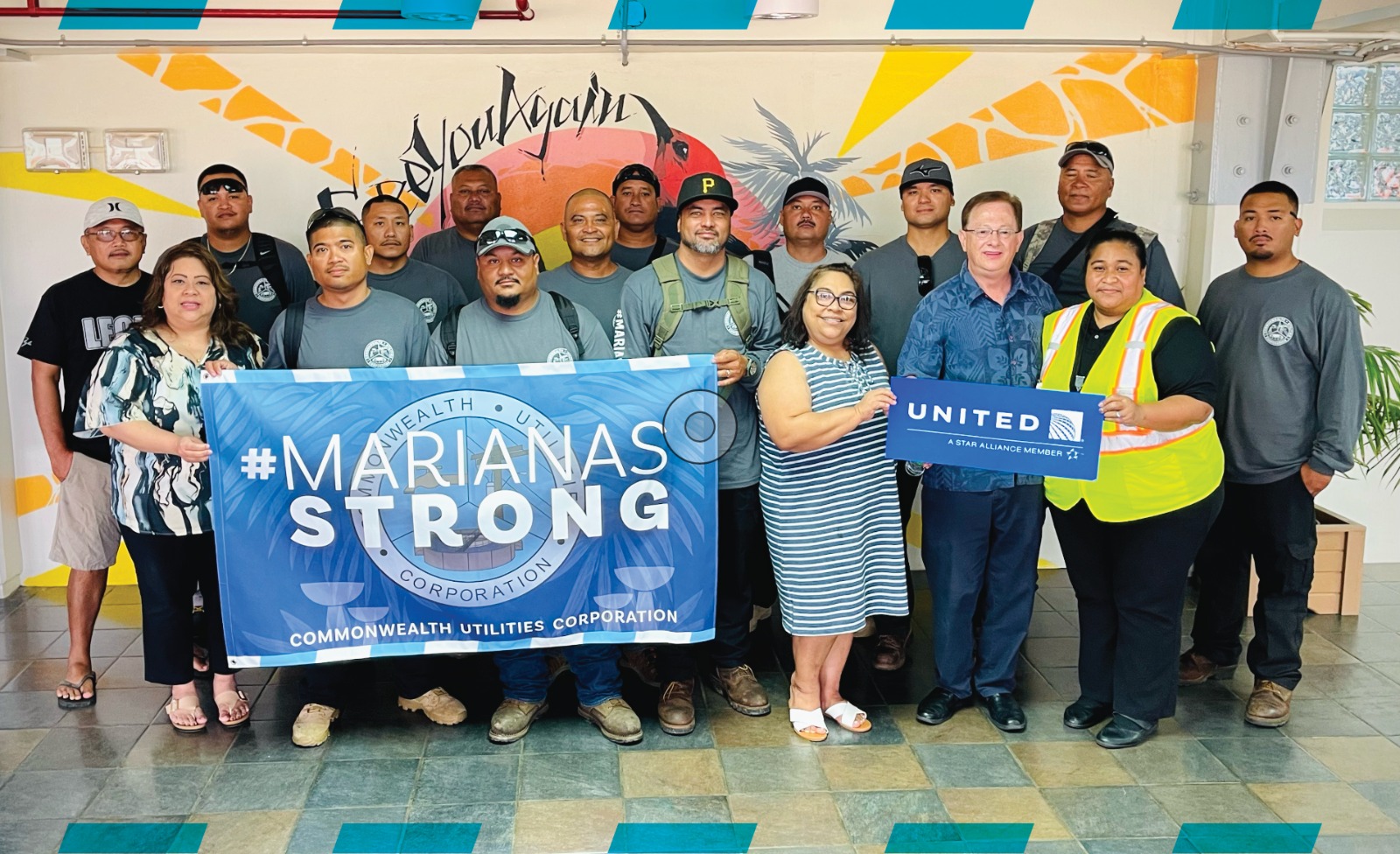 Commonwealth Utilities Corporation and United Airlines officials pose for a photo with the Guam-bound CUC line crewmembers at the Saipan airport.