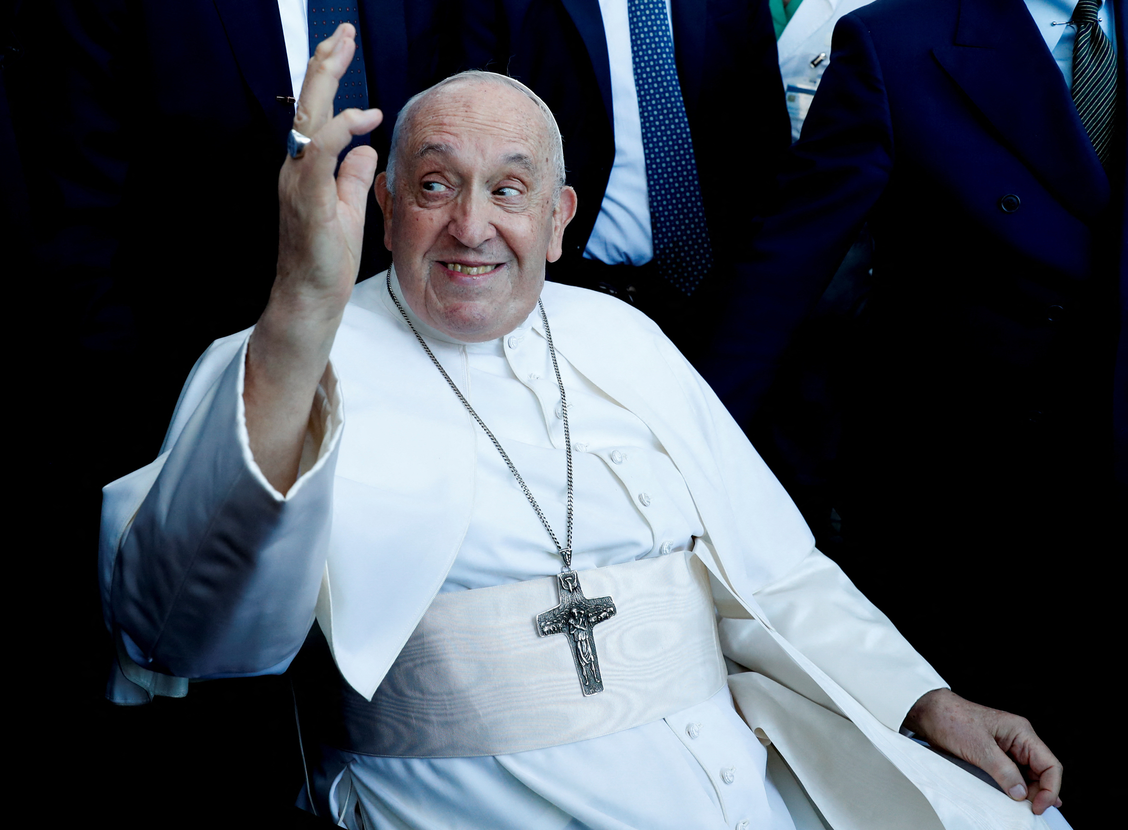 Pope Francis greets people on the day of his discharge from Gemelli hospital in Rome, Italy, June 16, 2023. REUTERS/Remo Casilli