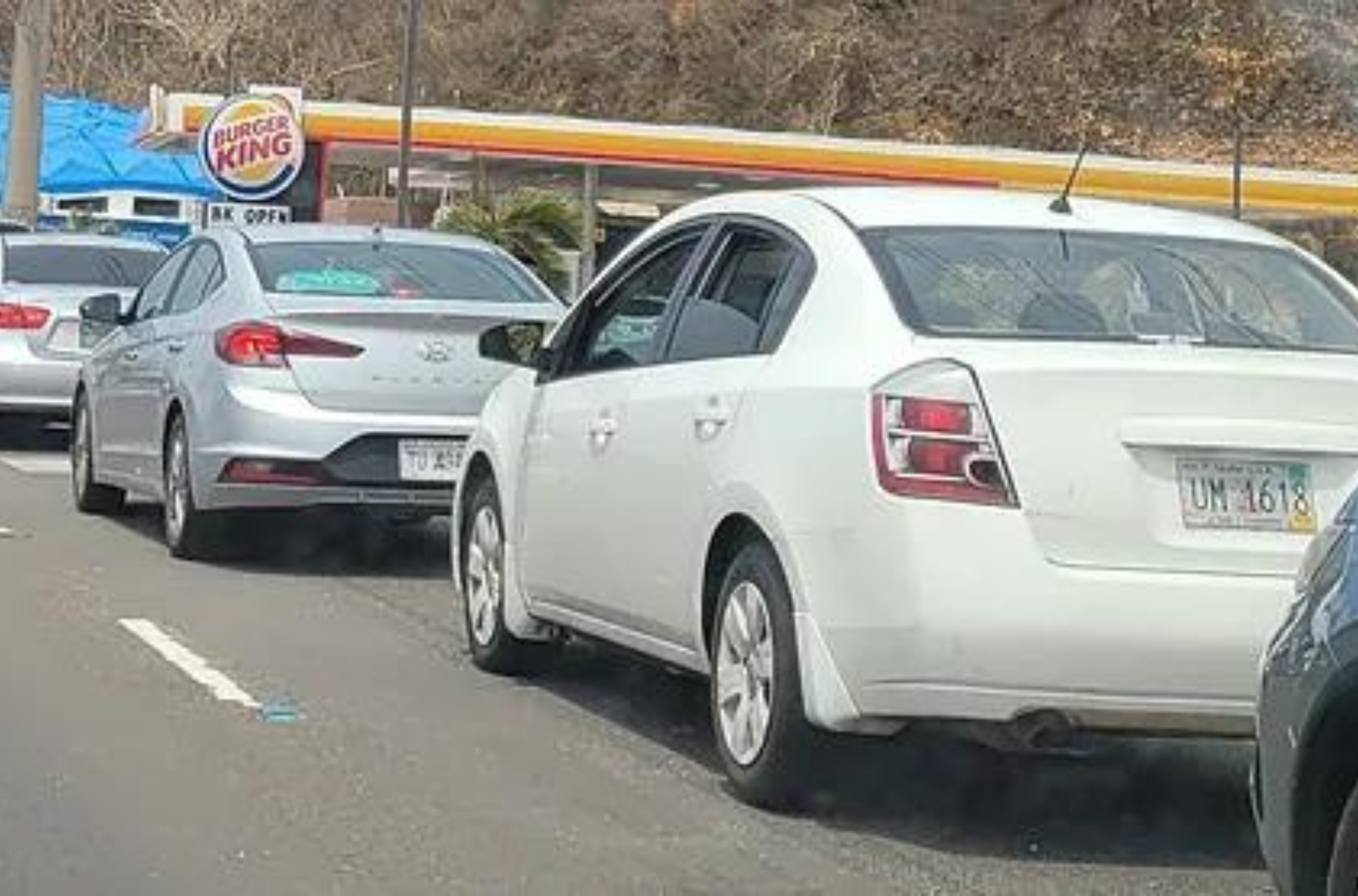 Guam motorists waited long hours in gas lines after typhoon Mawar. 