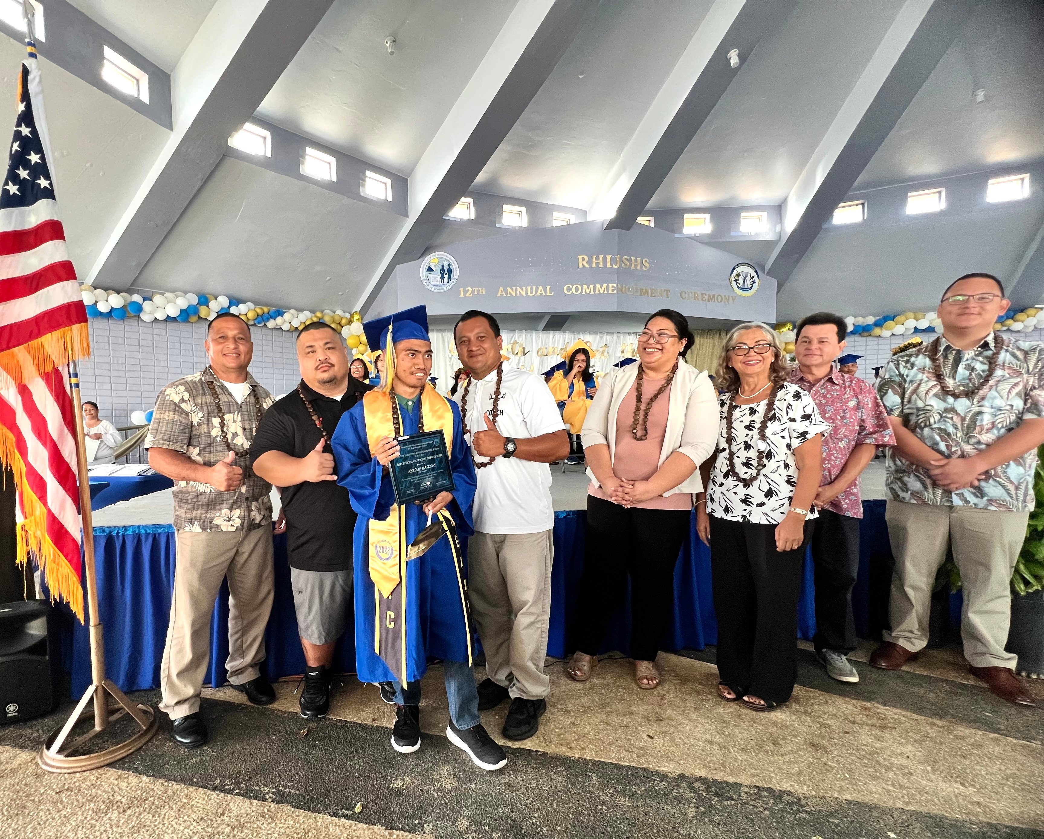 Rota Municipal Council members Jim Atalig, Frederic Manglona and Jonovan Lizama present the 18th Rota Municipal Council’s Most Improved Award to Sean Gabriel Macugay. Also in photo are Rota Mayor Aubry Hocog, Special Assistant for Women’s Affairs Barbara Sablan and Lt. Gov. David M. Apatang’s Chief of Staff Henry Hofschneider.