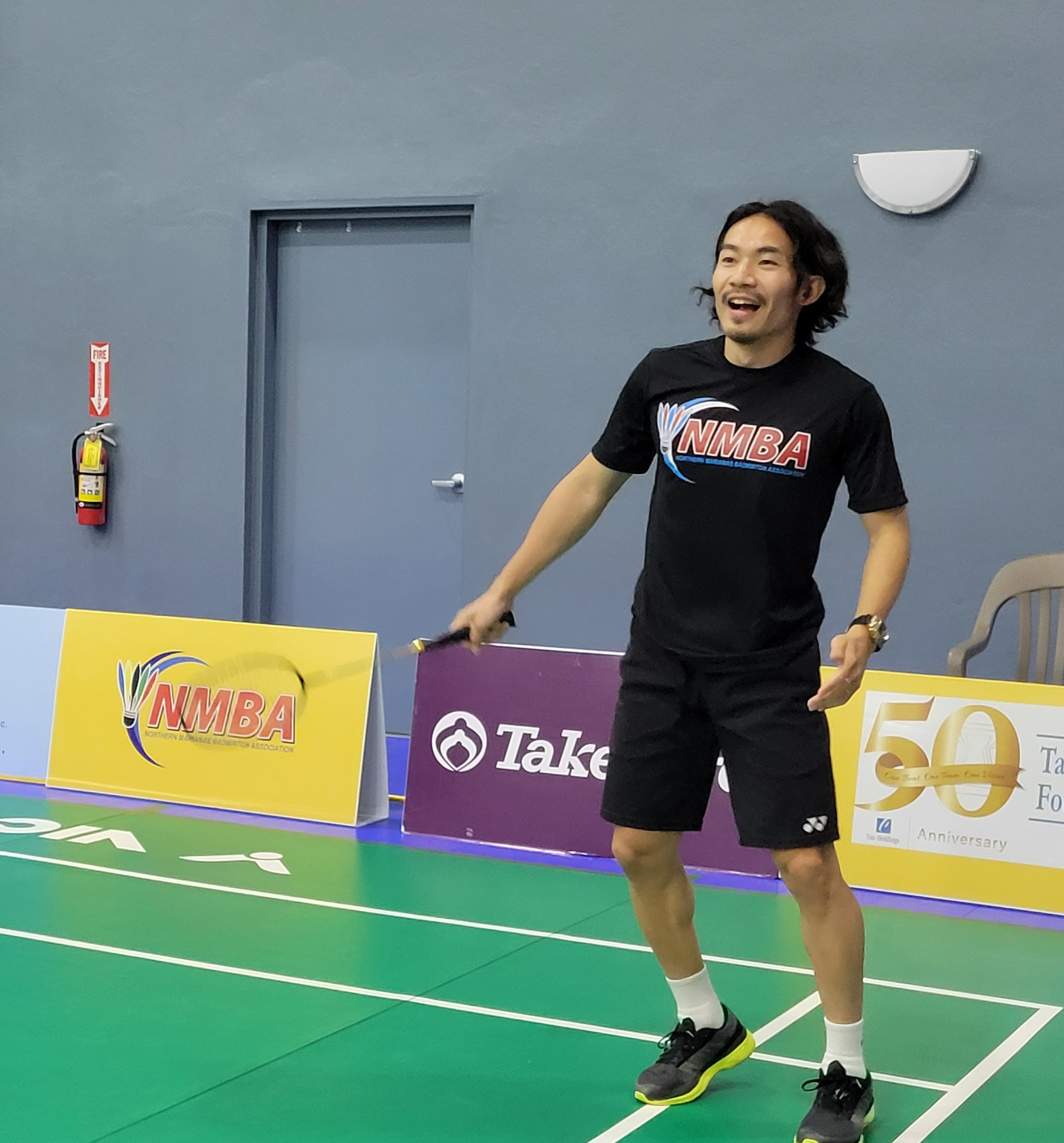 Japanese coach and Olympian Keigo Sonoda reacts during a training session with his players who are competing in the Crowne Plaza Northern Marianas Open on Monday at the Gilbert C. Ada Gymnasium.