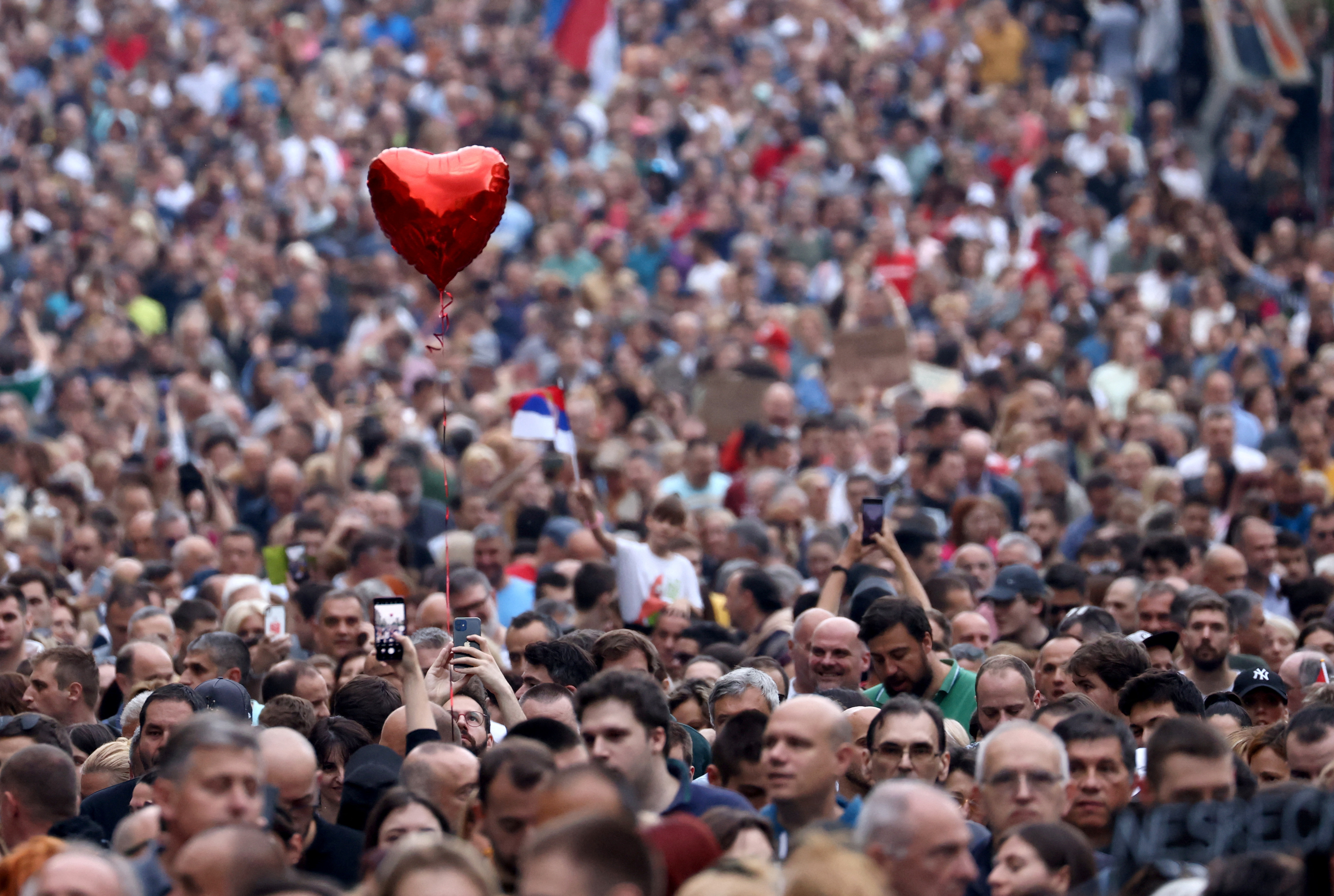 People attend a demonstration "Serbia against violence" organized by Serbia's opposition parties in reaction to the two mass shootings in the same week, in Belgrade, Serbia, June 17, 2023. REUTERS/Marko Djurica