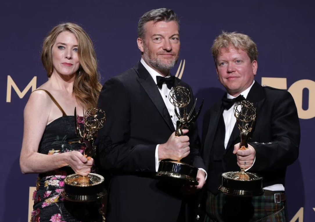 Annabel Jones, Charlie Brooker and Russel McLean pose backstage with their Outstanding Television Movie award for “Bandersnatch” (Black Mirror) at the 71st Primetime Emmy Awards in Los Angeles, California, Sept. 22, 2019.