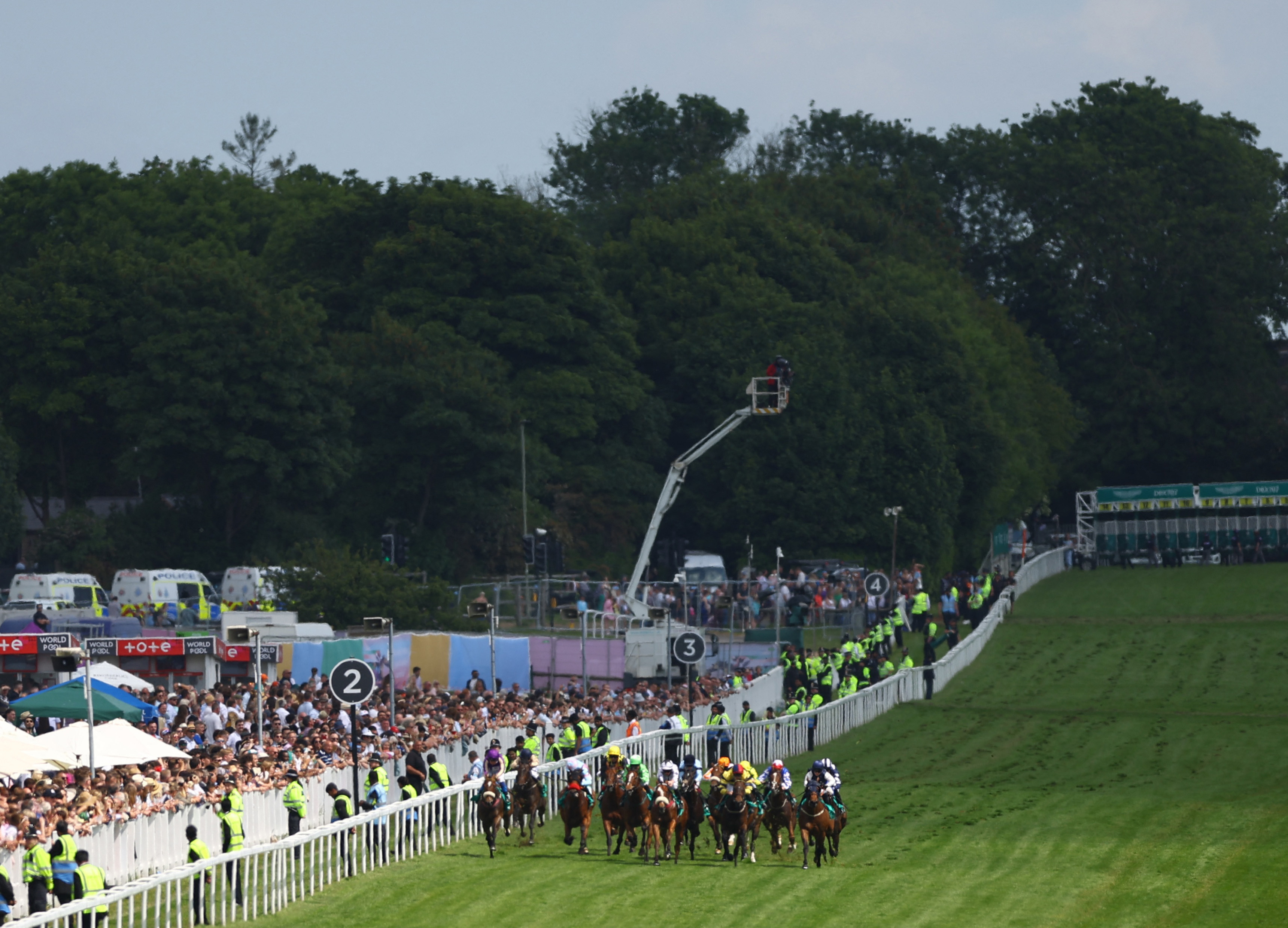 Horse Racing - Epsom Derby Festival - Epsom Downs Racecourse, Epsom, Britain - June 3, 2023 General view of riders during the 14:45 Aston Martin 3YO 'Dash' Handicap Action Images via Reuters/Matthew Childs