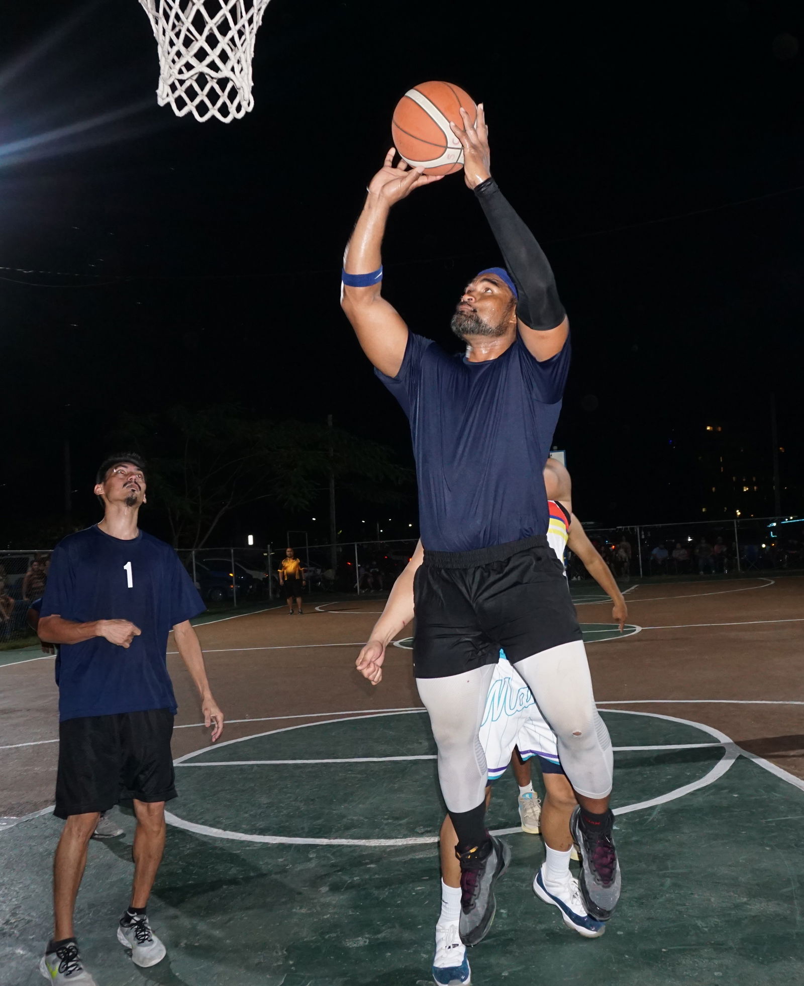 The Martech Ol'Aces' Kelvin Fitial takes the uncontested shot against The Game during an open division game of the Saipan Centennial Lions Club Invitational Basketball League Wednesday at the Civic Center basketball court.