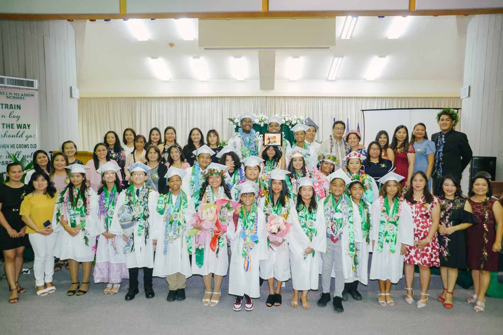 The newly promoted elementary and middle school students.