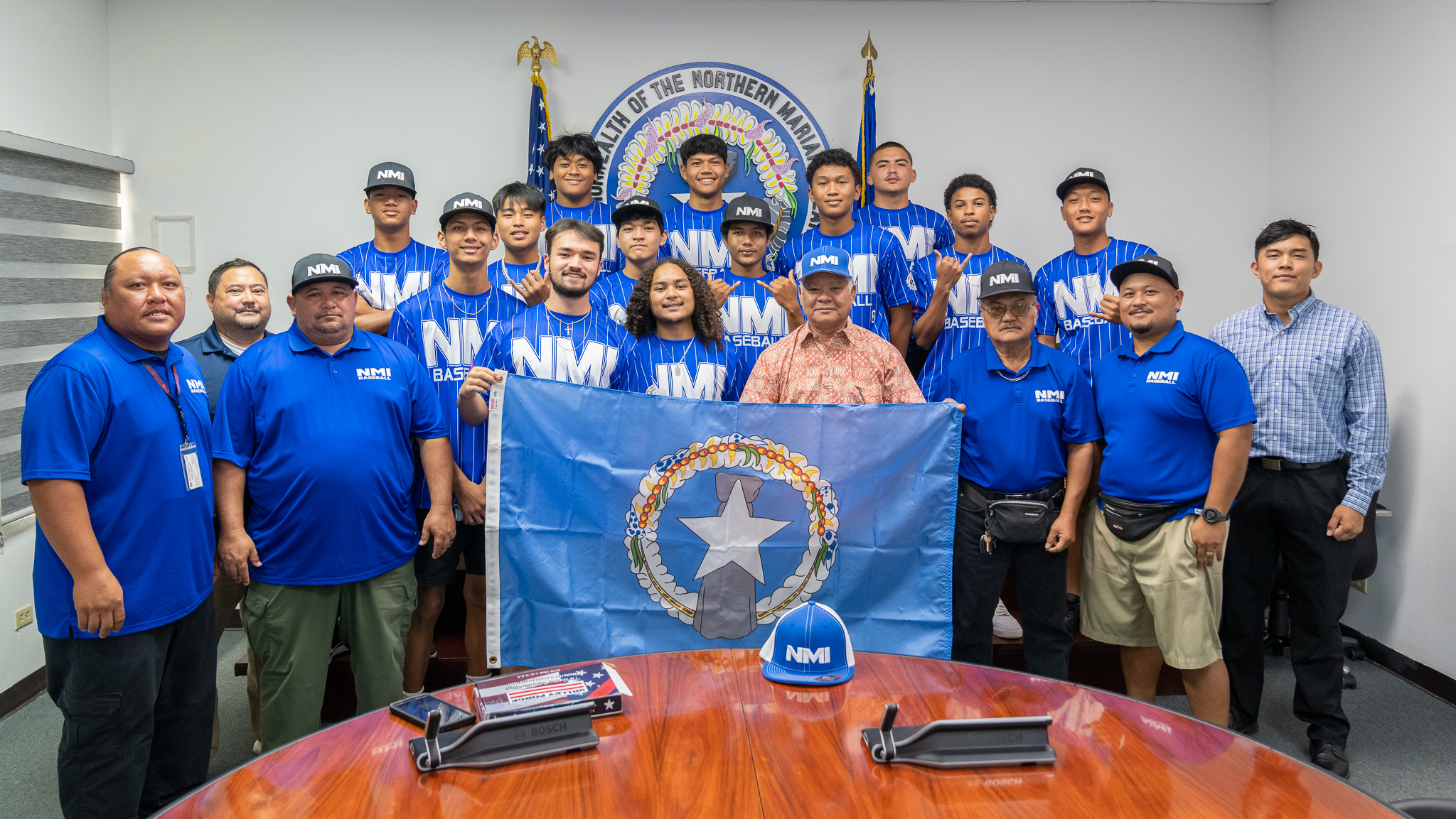 Governor Arnold I. Palacios on Tuesday met with members of the  NMI U18 Baseball Team players and coaches and wished them luck as the team prepares to head to Palau later this week to represent the CNMI in an upcoming baseball tournament. The team will compete against teams from Palau, including its national team that represented Palau in last year’s Pacific Mini Games. Governor Palacios also presented a CNMI flag to the U18 Junior National Baseball Team to showcase in their upcoming competition.