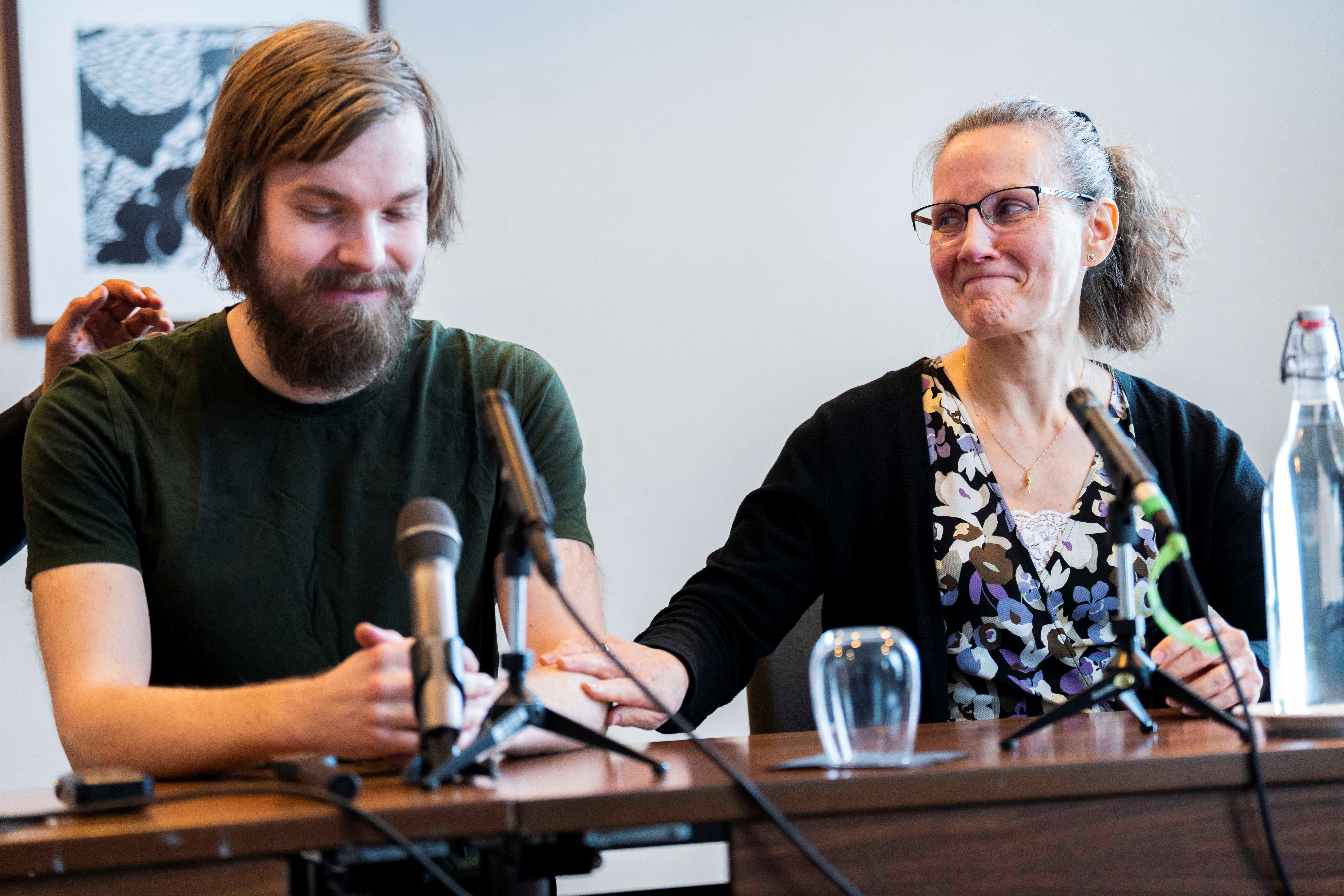 Danish citizen Thomas Kjems, together with his mother, speaks during a press conference after arriving at Copenhagen Airport, in Copenhagen, Denmark June 3, 2023 after being released from detention in Iran. Thomas Kjems and two other Europeans were released from detention by Iran in the latest in a series of prisoner swaps. Ritzau Scanpix/Martin Sylvest via REUTERS
