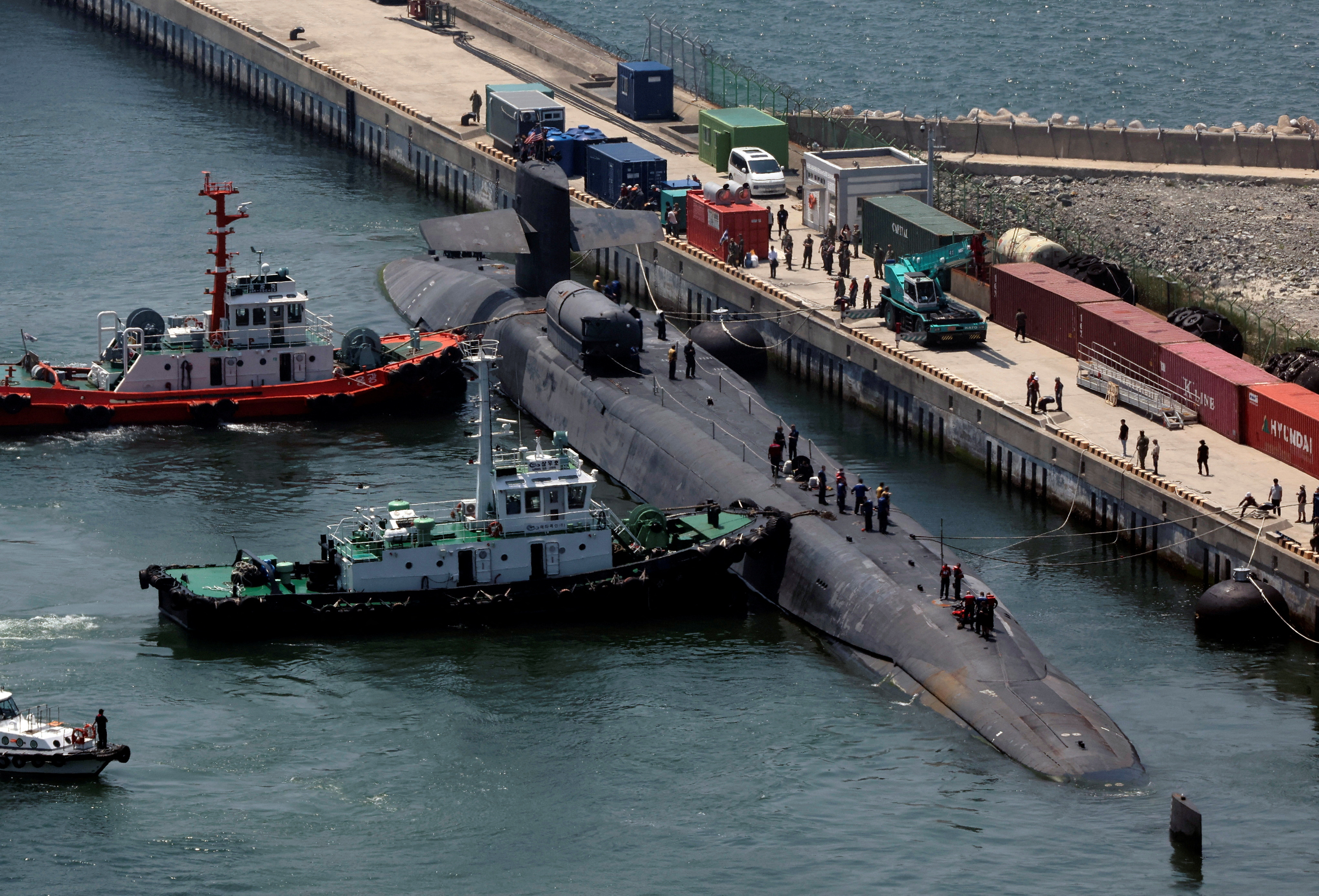 Ohio-class U.S. nuclear-powered submarine USS Michigan (SSGN 727) is anchored at a port in Busan, South Korea, June 16, 2023. Yonhap via REUTERS