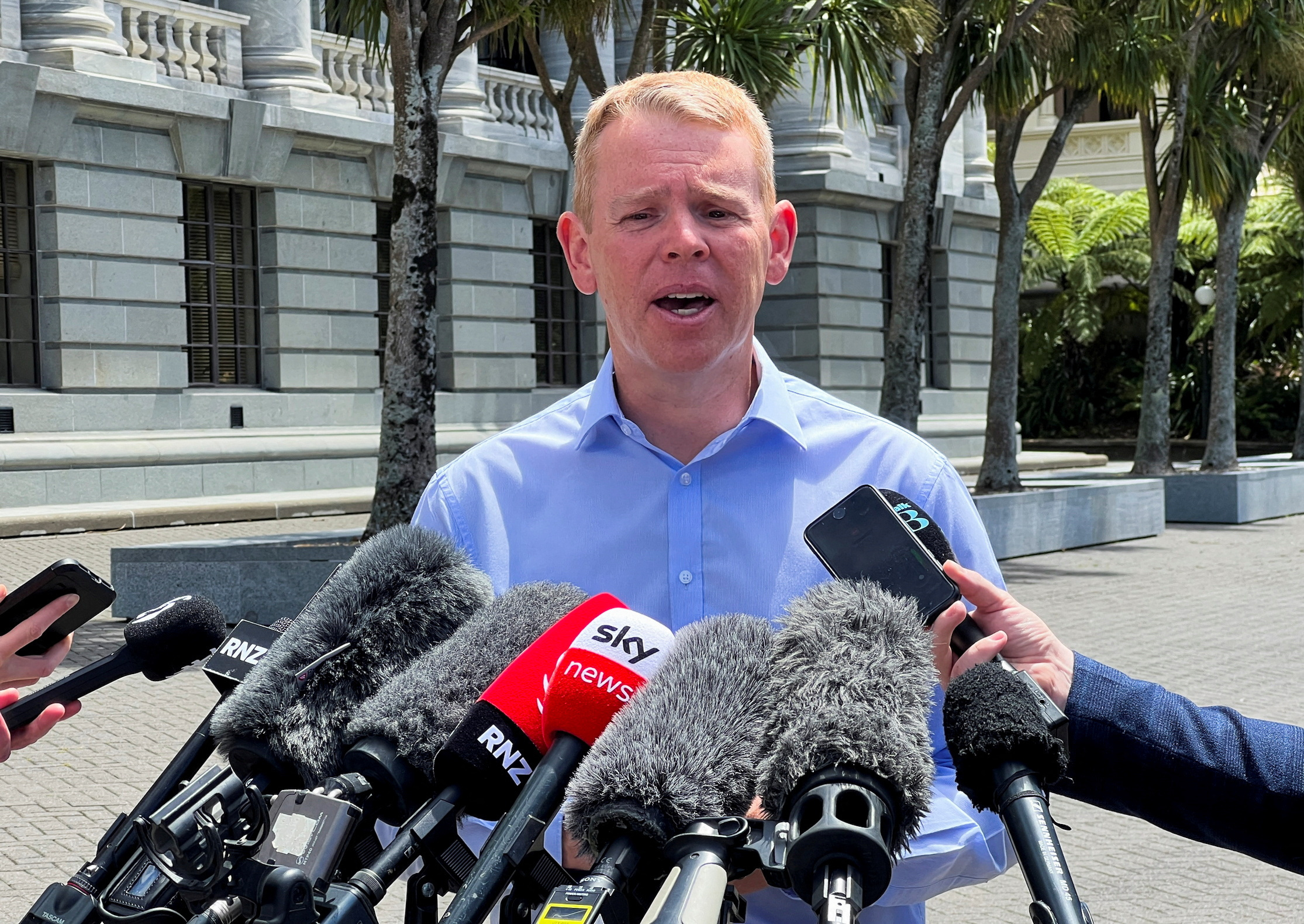 FILE PHOTO: Chris Hipkins speaks to members of the media, after being confirmed as the only nomination to replace Jacinda Ardern as leader of the Labour Party, outside New Zealand's parliament in Wellington, New Zealand January 21 2023. REUTERS/Lucy Craymer/File Photo