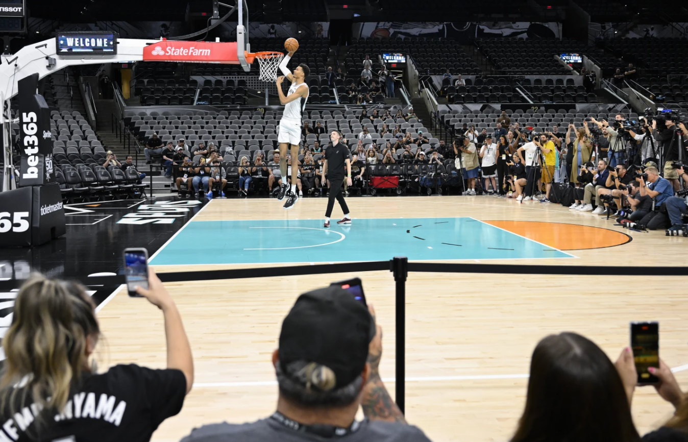 San Antonio Spurs’ Victor Wembanyama dunks during an NBA basketball media event, Saturday, June 24, 2023 at the AT&T Center in San Antonio.