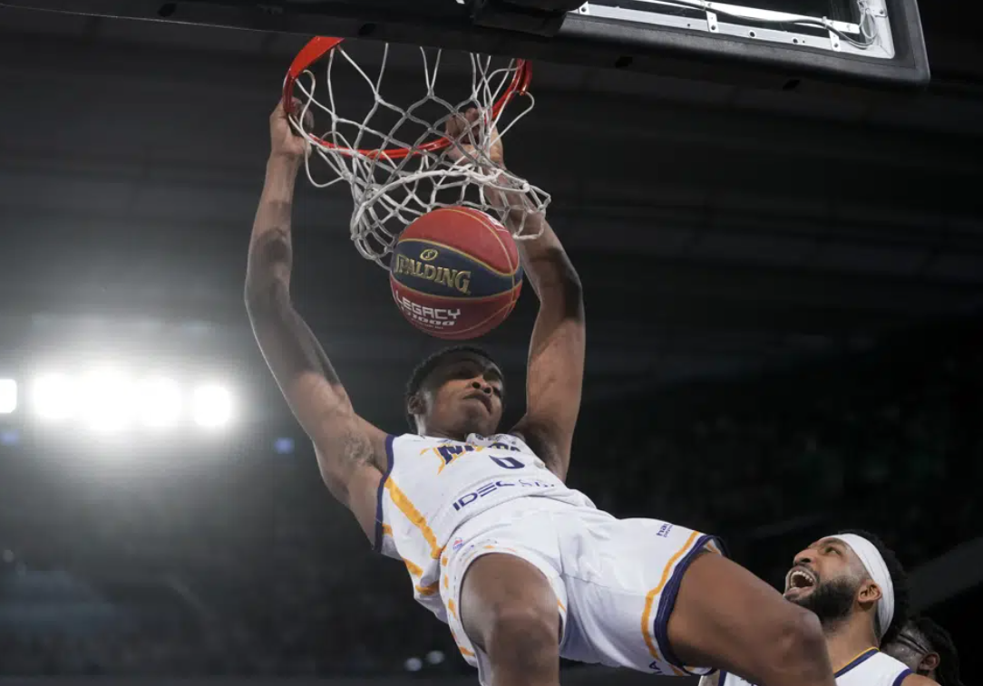 Boulogne-Levallois' Bilal Coulibaly dunks the ball in action during the playoffs of the Elite basketball match Boulogne-Levallois against Monaco at the Roland Garros stadium in Paris, Thursday, June 15, 2023.